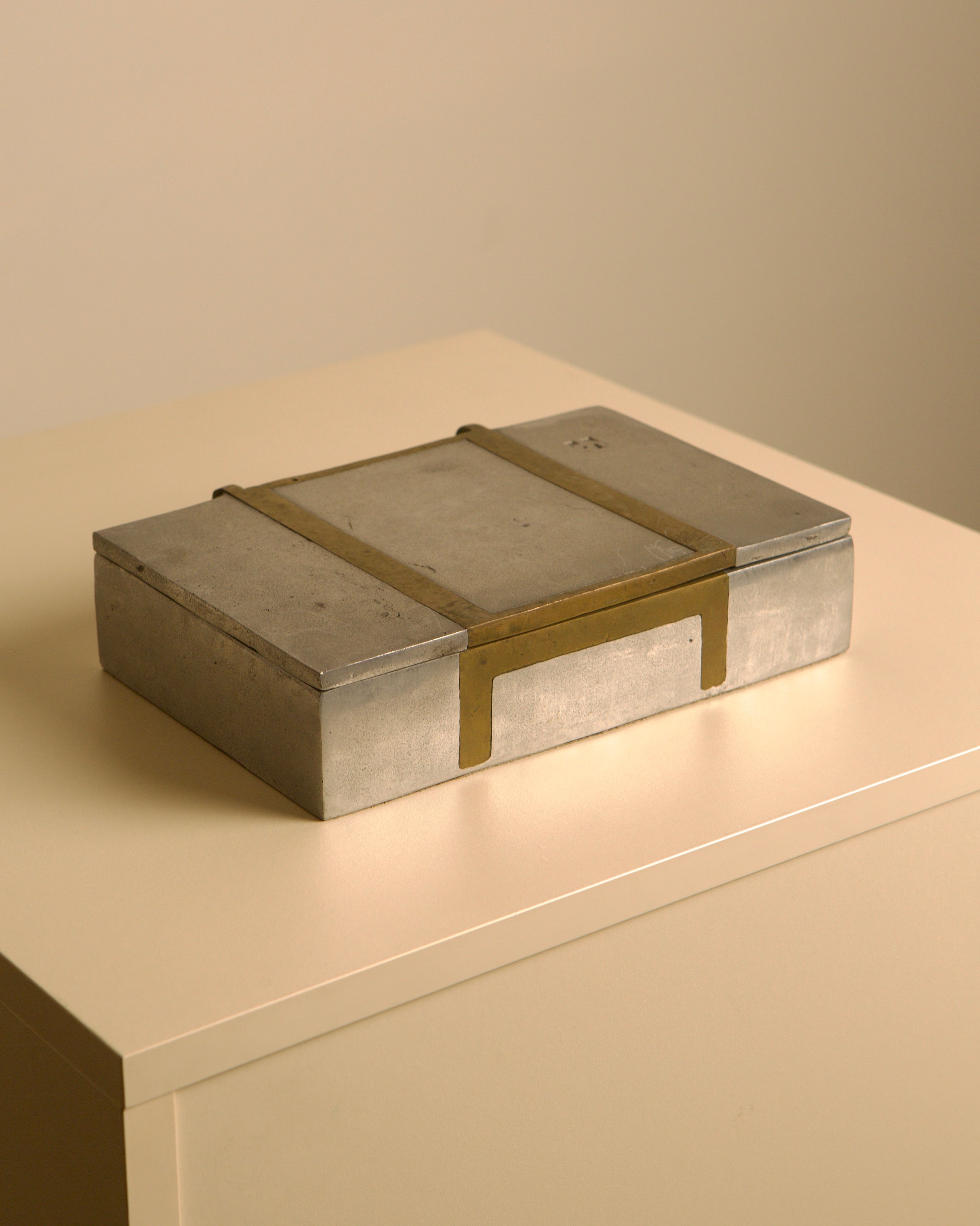 Large brutalist metal and brass box by David Marshall 70s — lifestyle setting