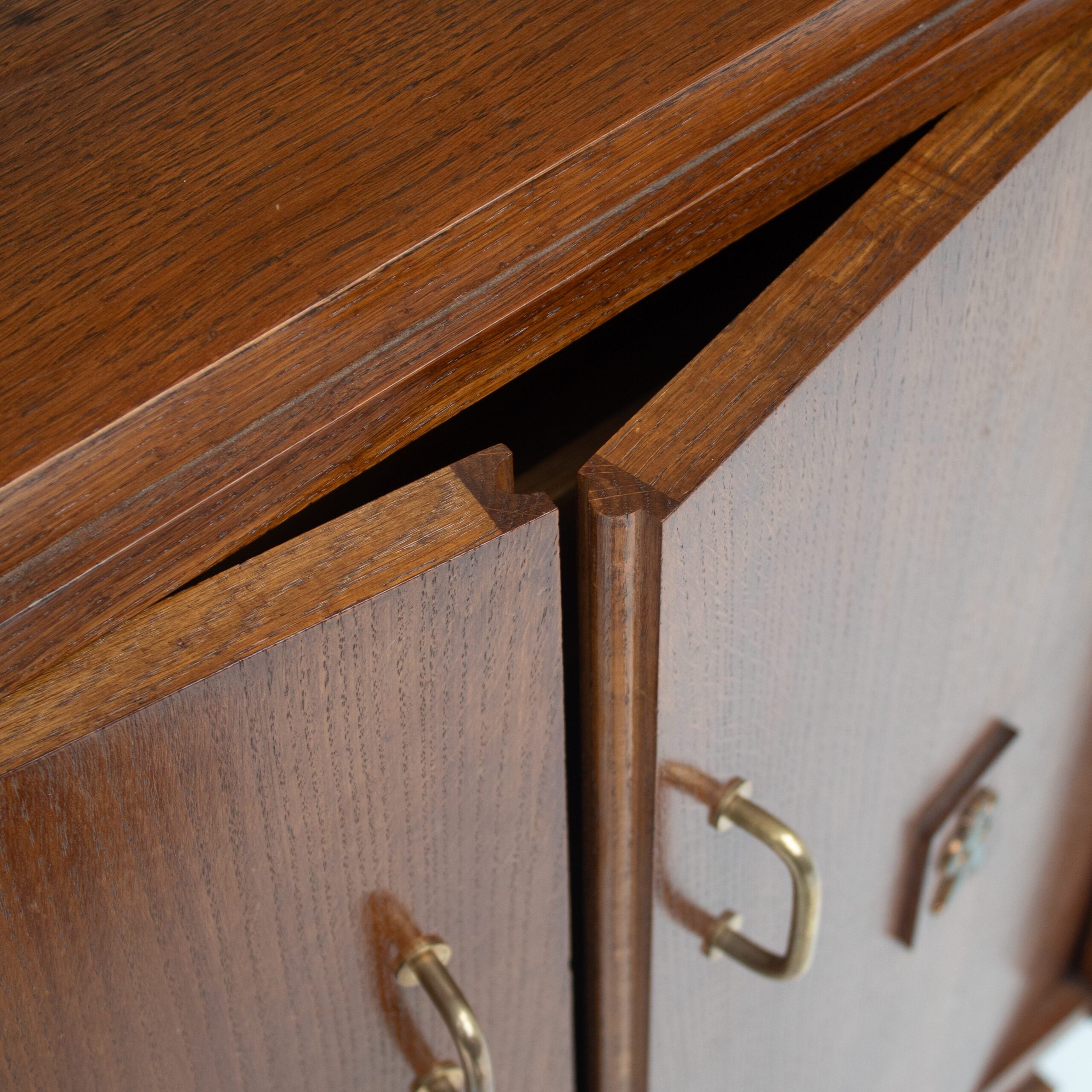 Mid-Century Oak Cabinet with Brass Handles and Decorative Inlays — alternate view