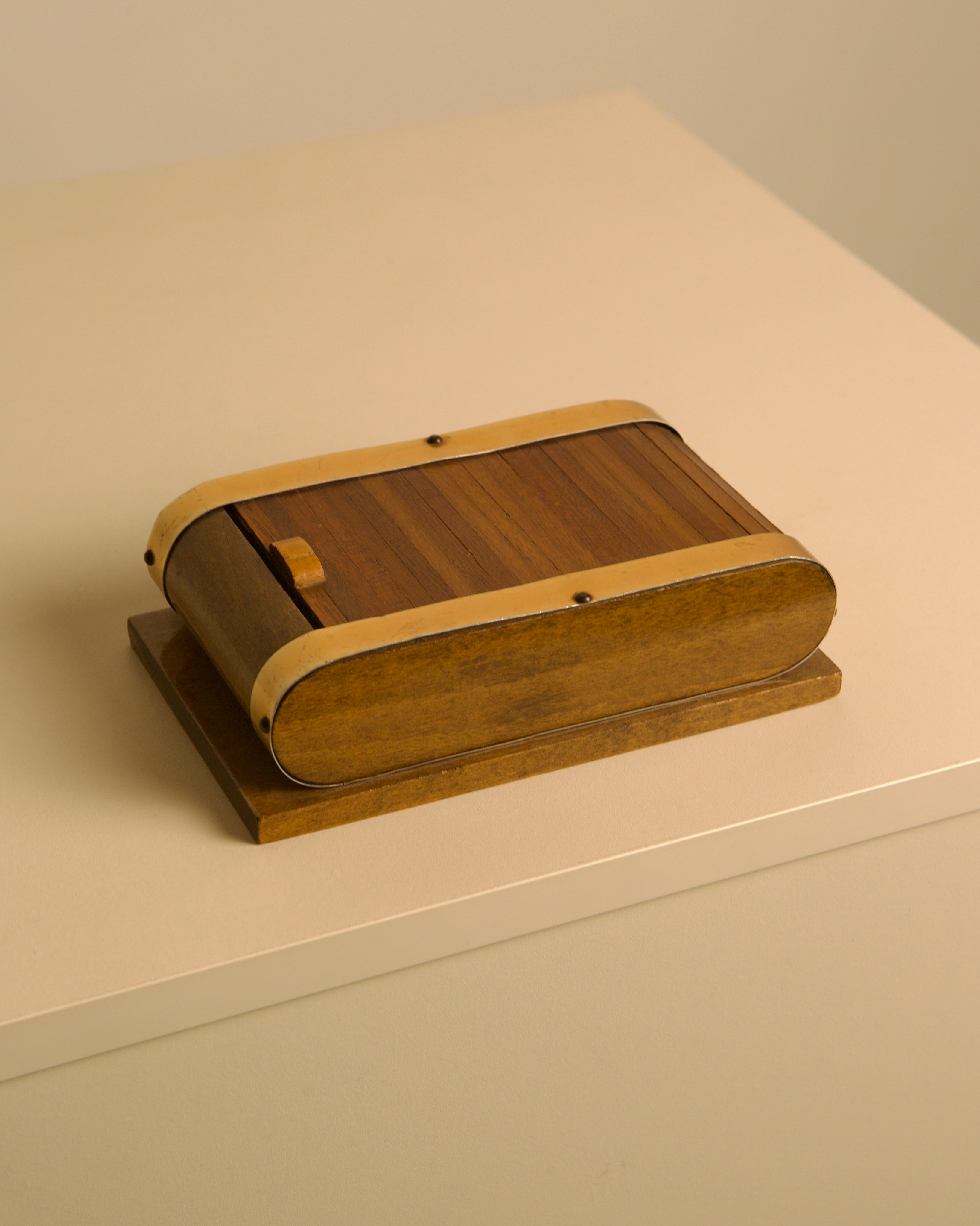 Italian Sliding Wood and Brass Box, 40s — close-up of wooden box with brass accents