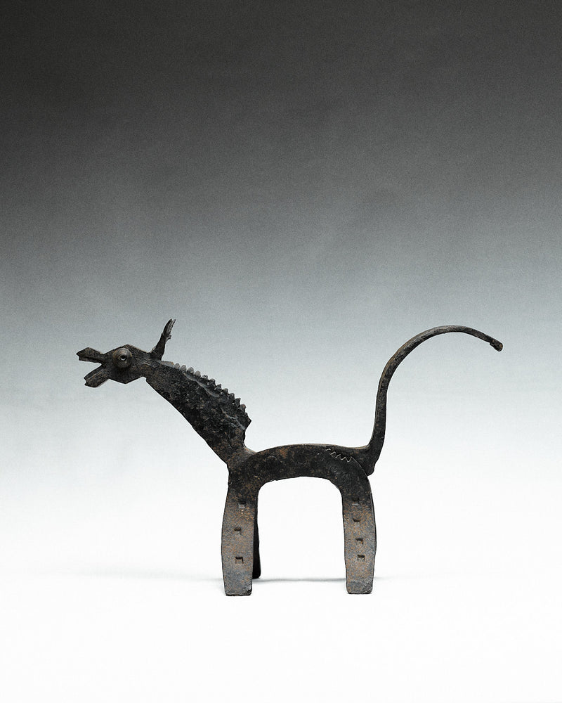 brutalist nutcracker, donkey — side view highlighting textured metal finish