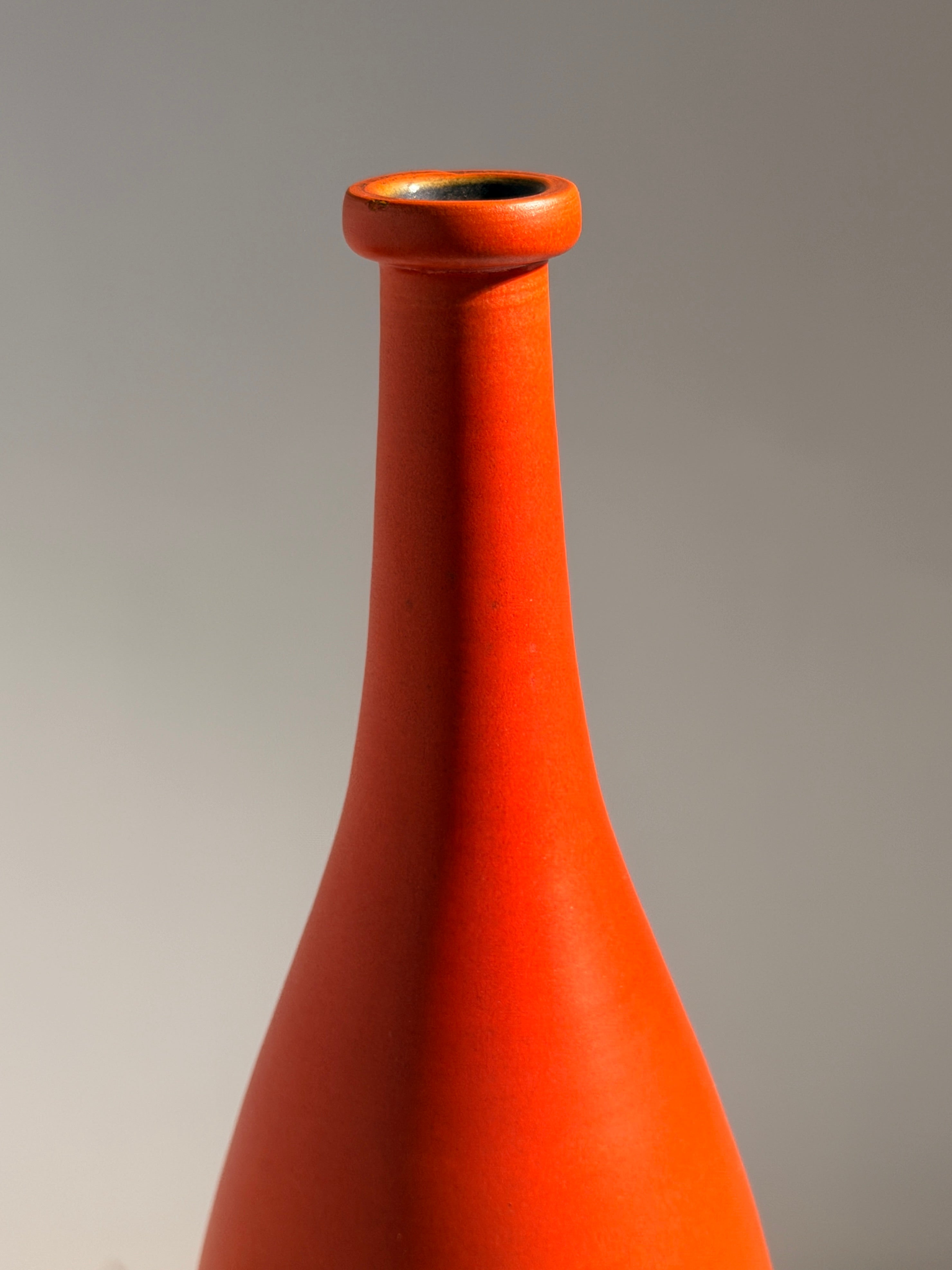 Large orange soliflore bottle vase by André-Jean Doucin, circa 1950 — lifestyle setting