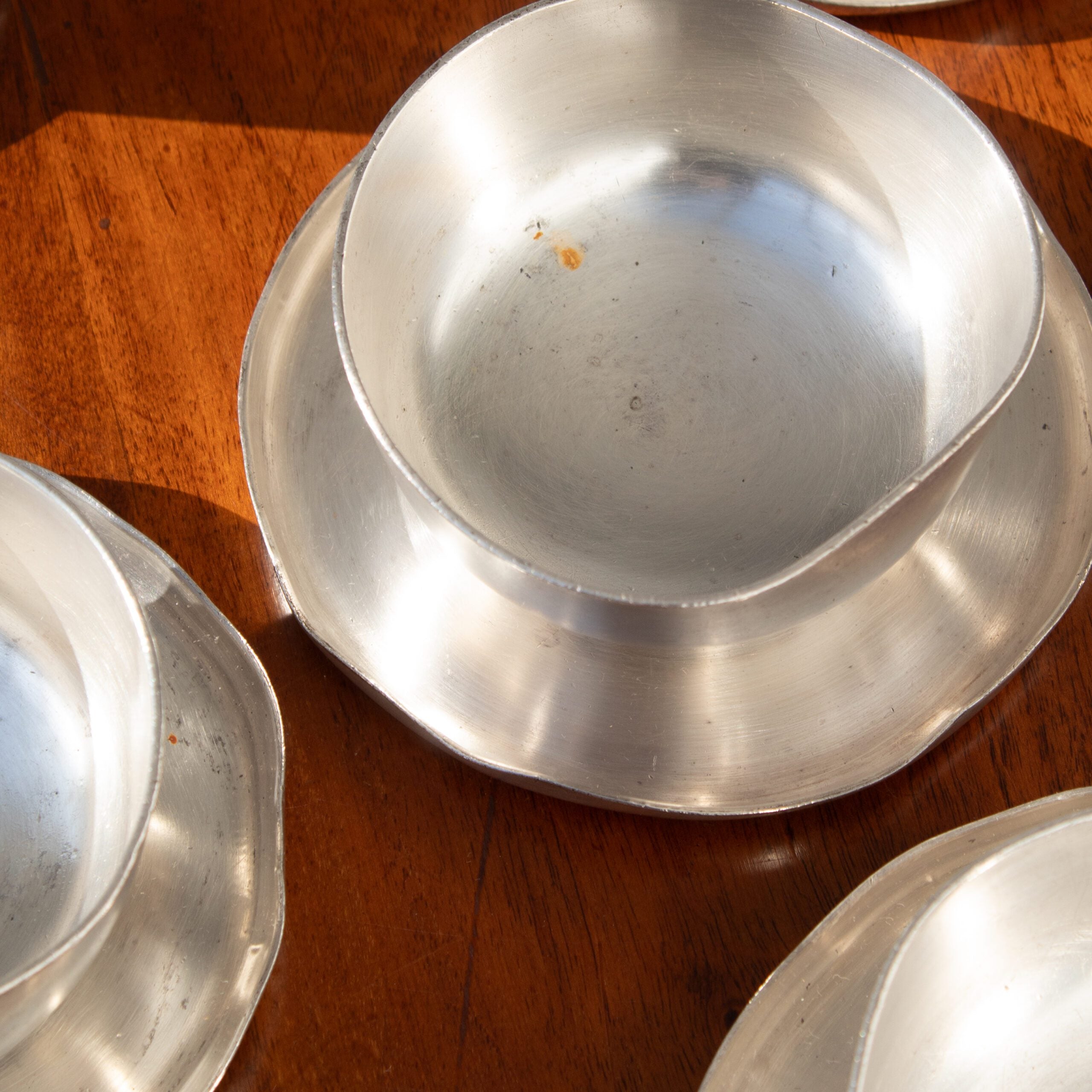 Metal Serving Bowl - Arthur Krupp — top view of aluminum bowl on wooden table