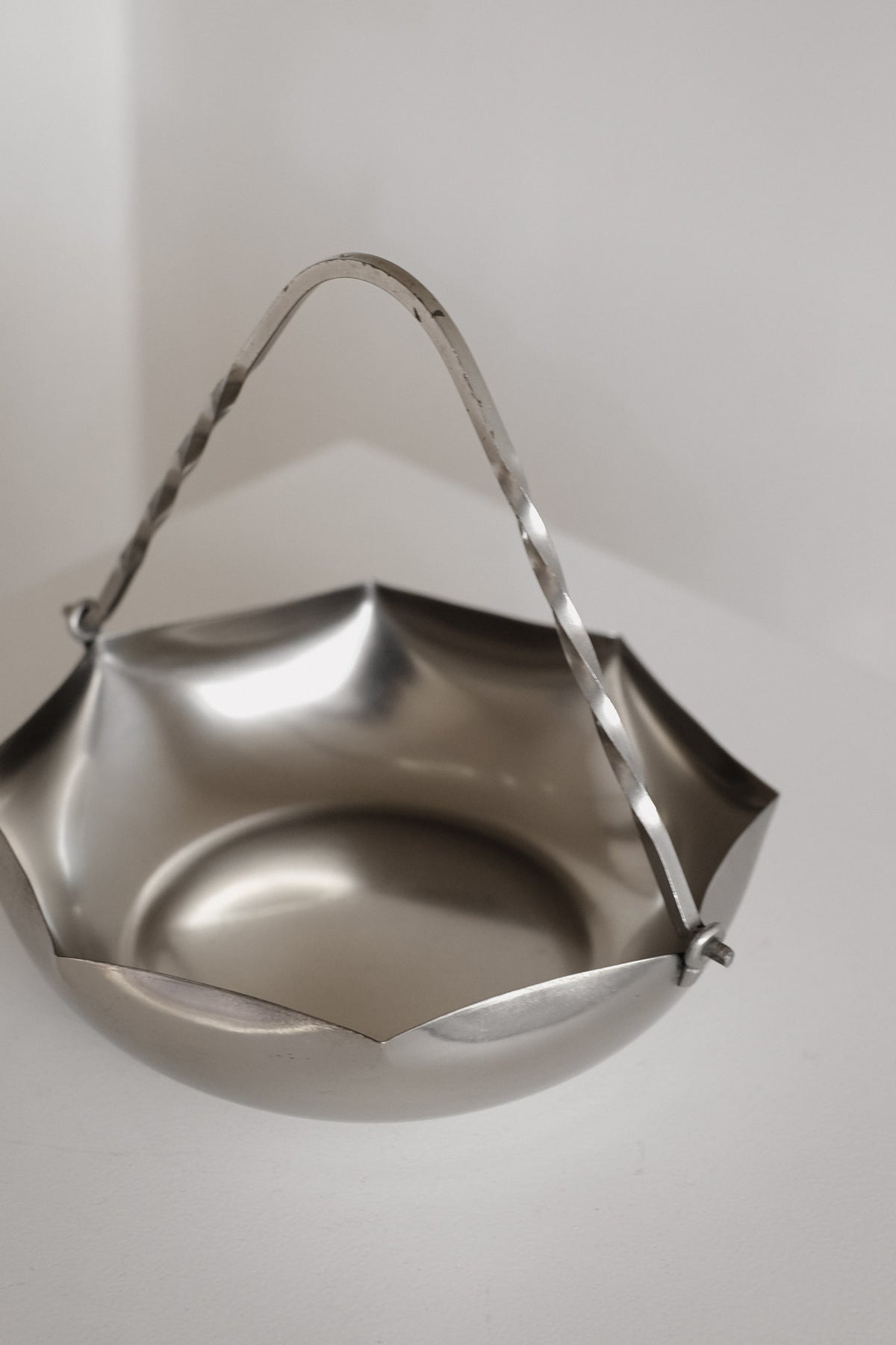Vintage Jeka Tiel Pewter Basket with Twisted Handle — side angle