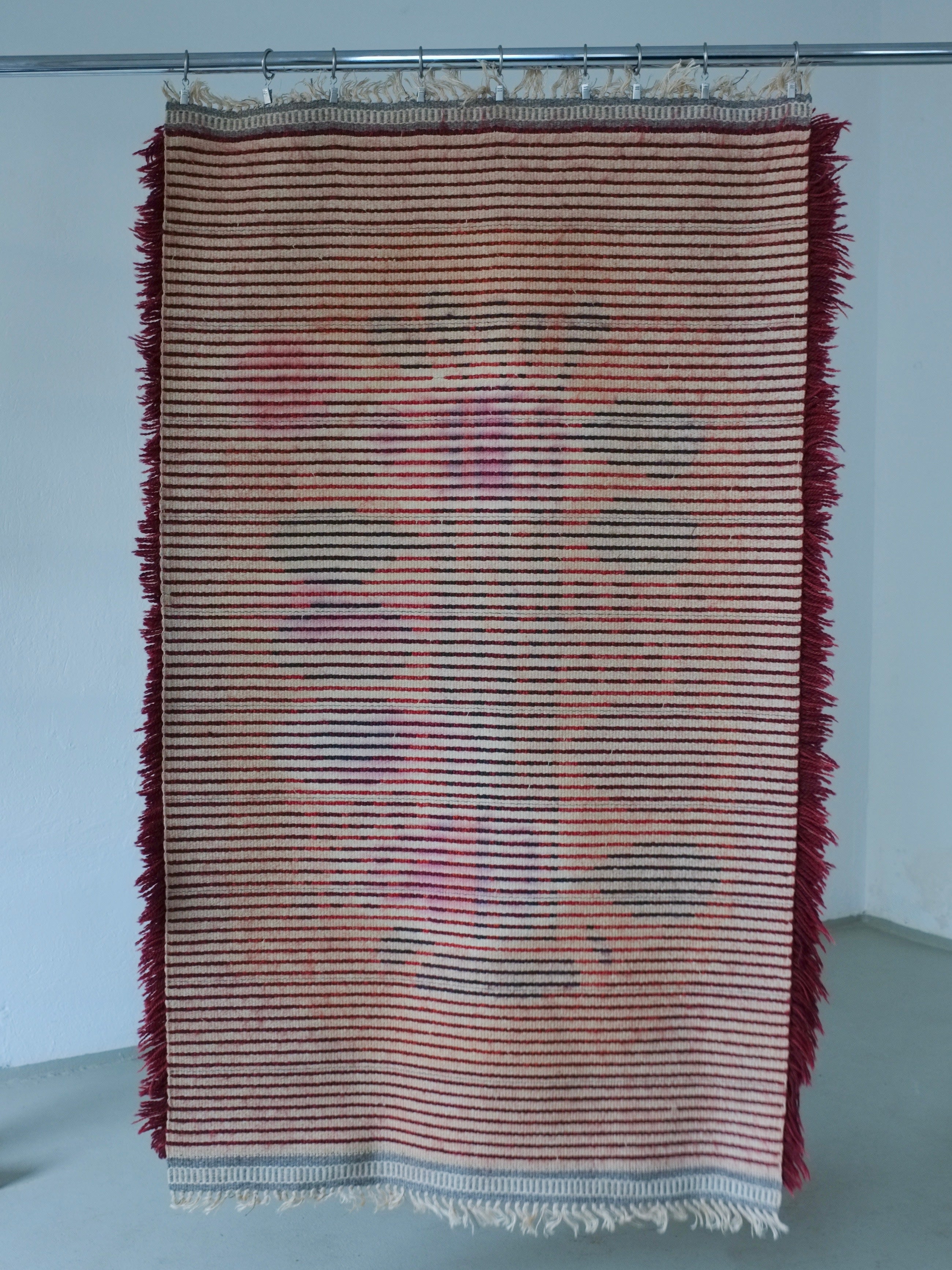 Vintage Swedish Red Wool Rya Rug | 1960s — side angle showing fringe detail