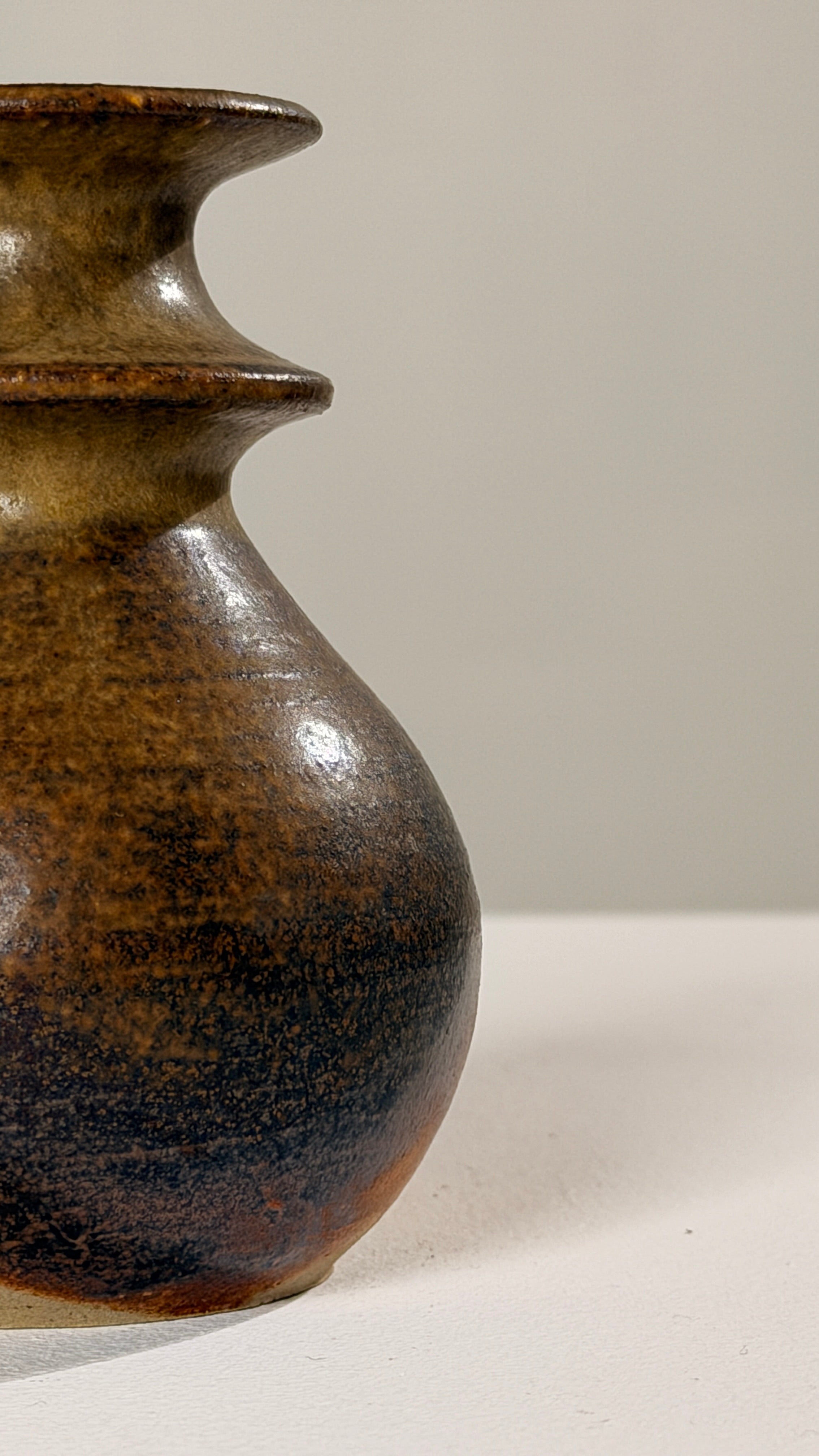 Stoneware Candleholder, France, circa 1960 — angled view highlighting earthy tones