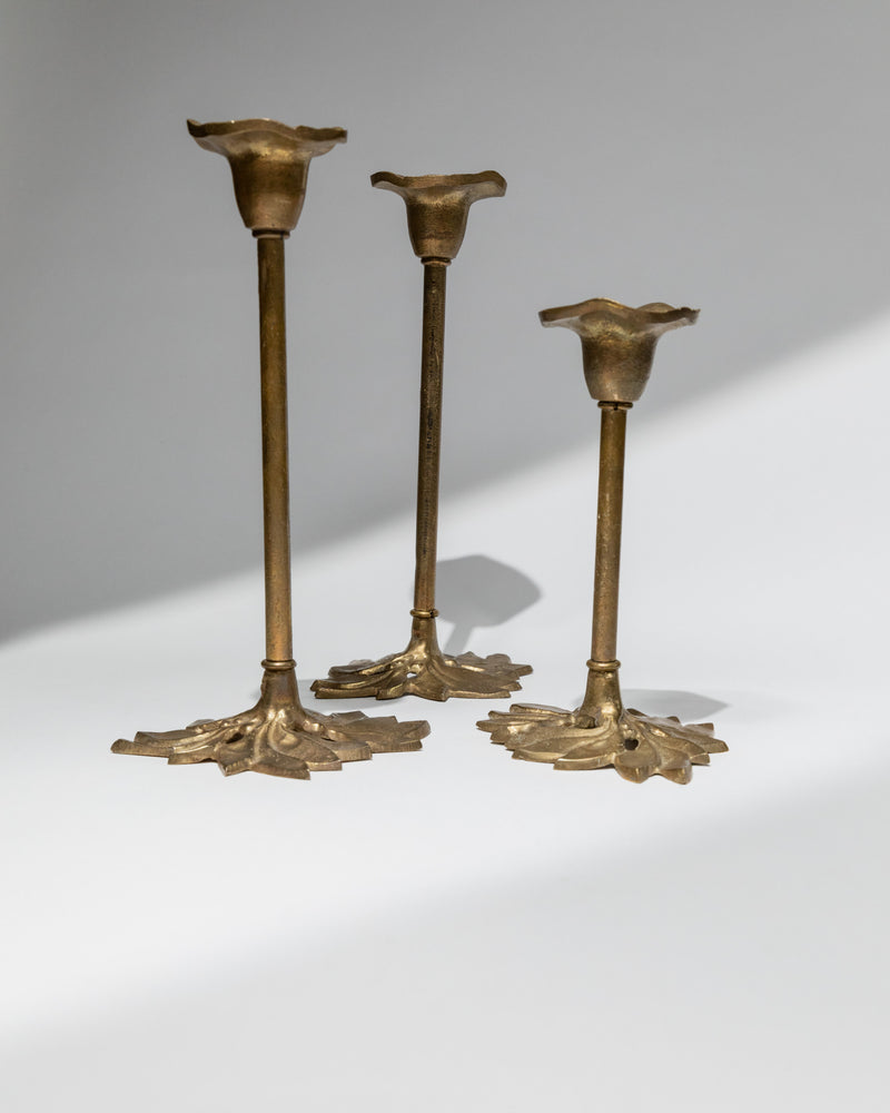 Set of three vintage brass candle holders with ornate bases, Italy 1940s