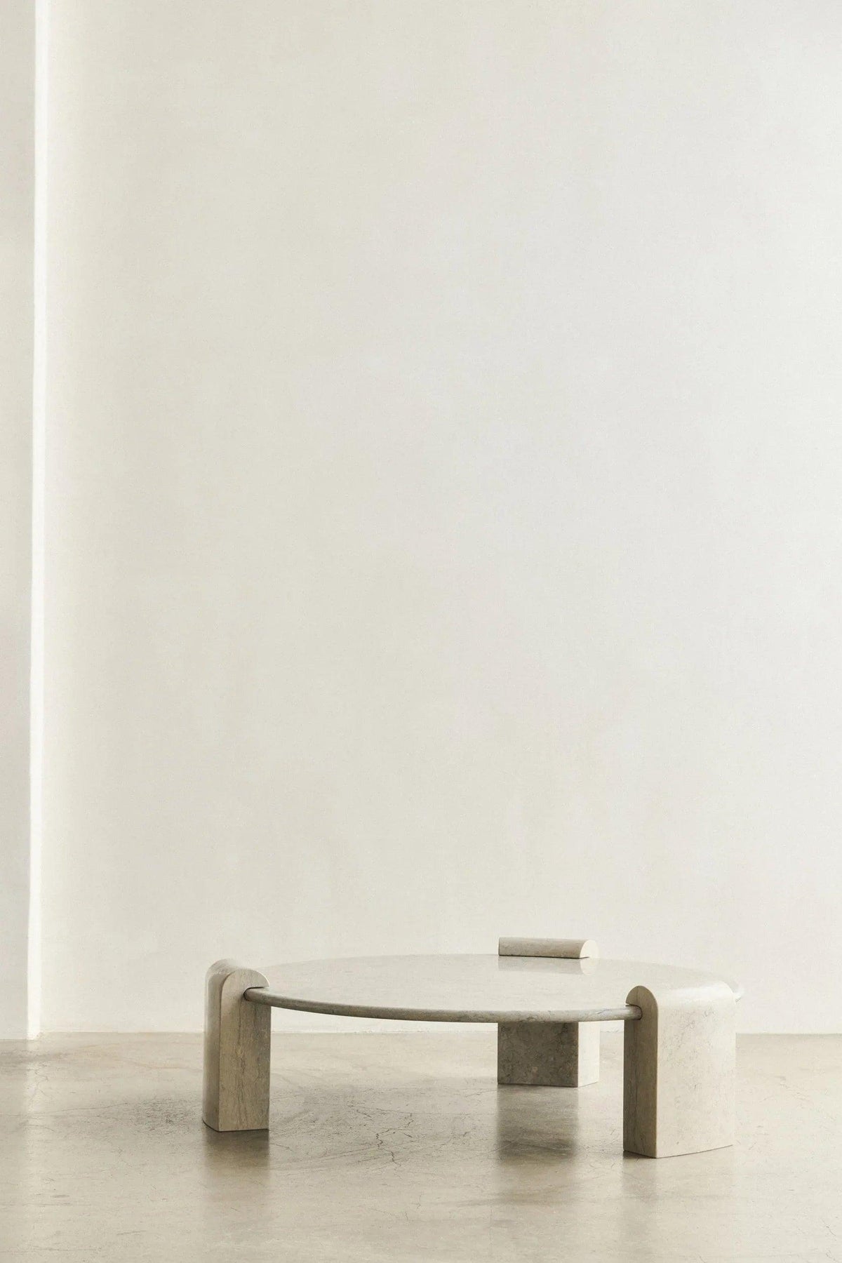 STONE COLUMN LOUNGE TABLE - ATAIJA AZUL LIMESTONE — close-up
