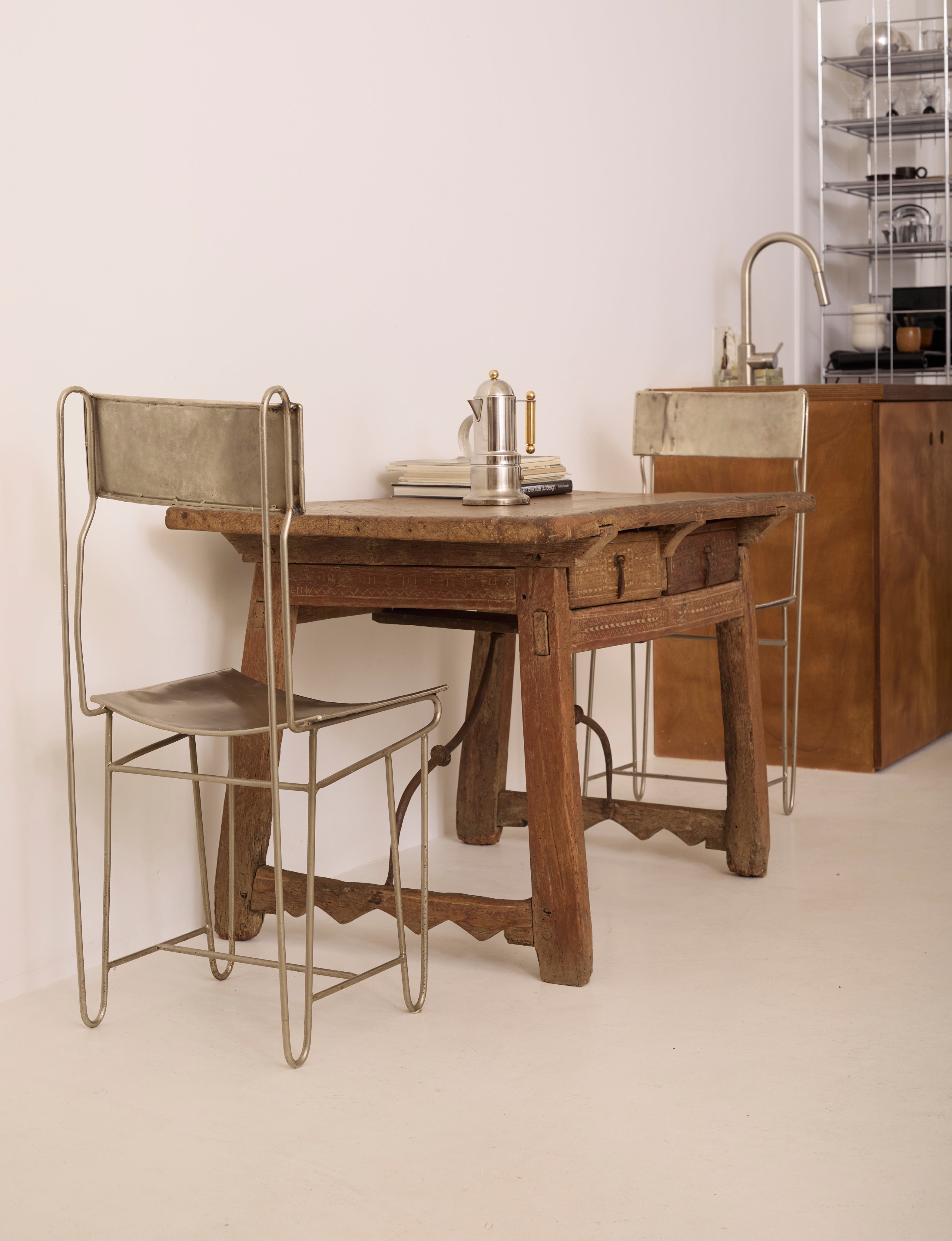 Spanish Folk Vernacular Table From The 17th Century — angled view in minimalist kitchen setting