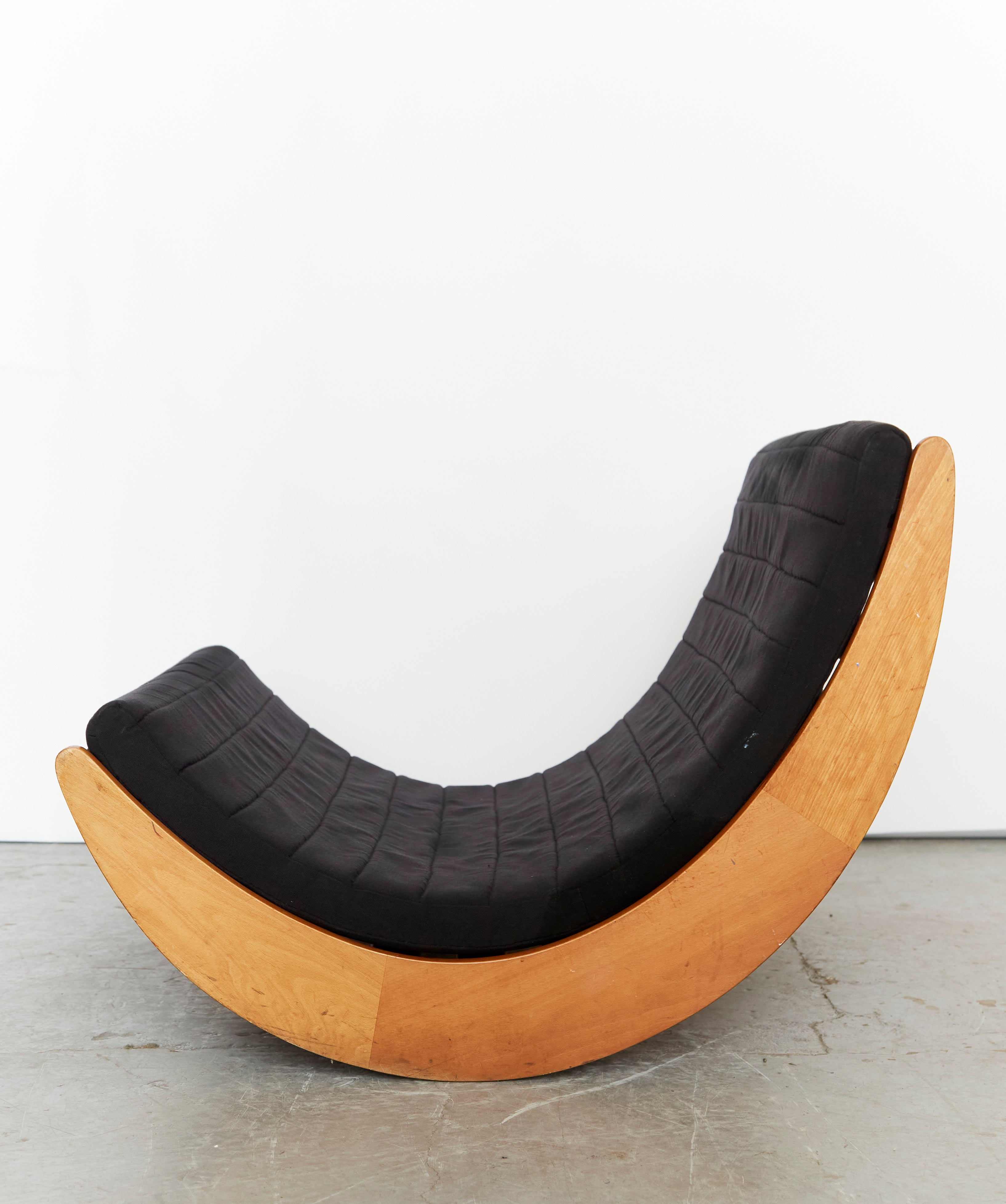 Tandem Relaxer 2for2 Rocking Chair by Verner Panton for Rosenthal — side angle showing curved wooden base and black upholster