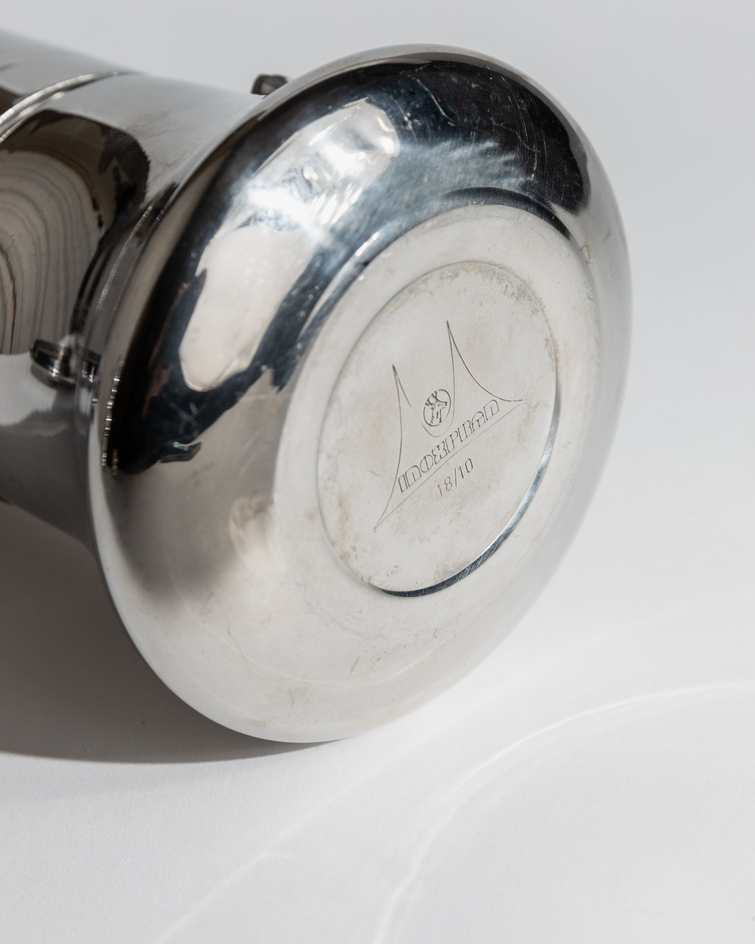 Bottom view showing stainless steel maker's mark on 1980s coffee set