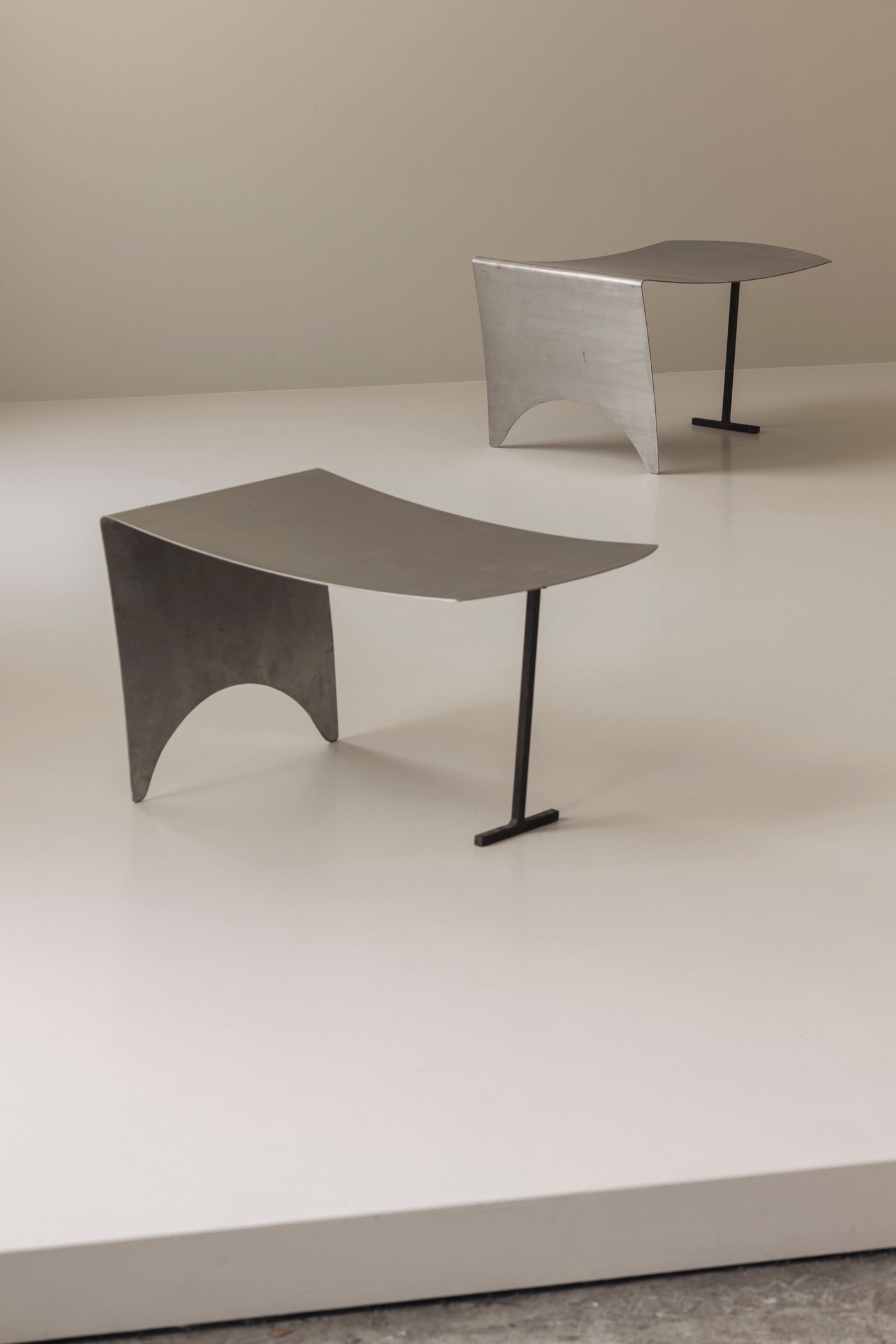 A striking set Modernist curved metal stools from France, dating to the 1980s. — view 9