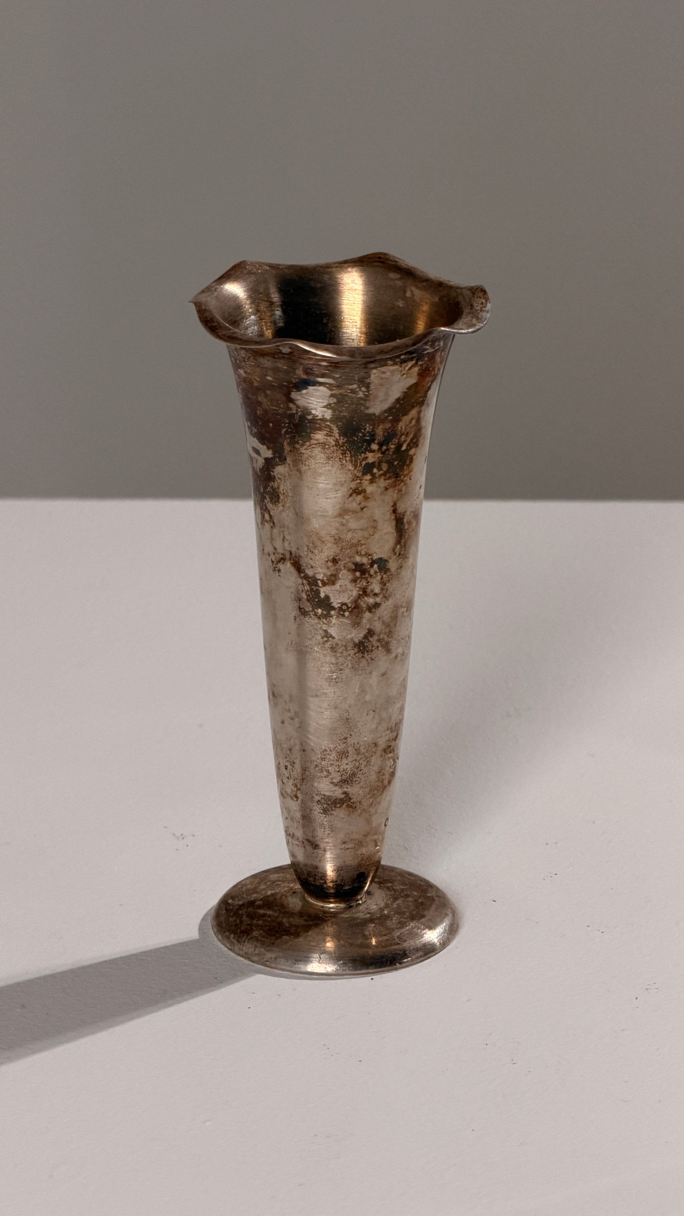 Silver-plated Metal Chalice, France, circa 1930 — side angle showing tarnished surface
