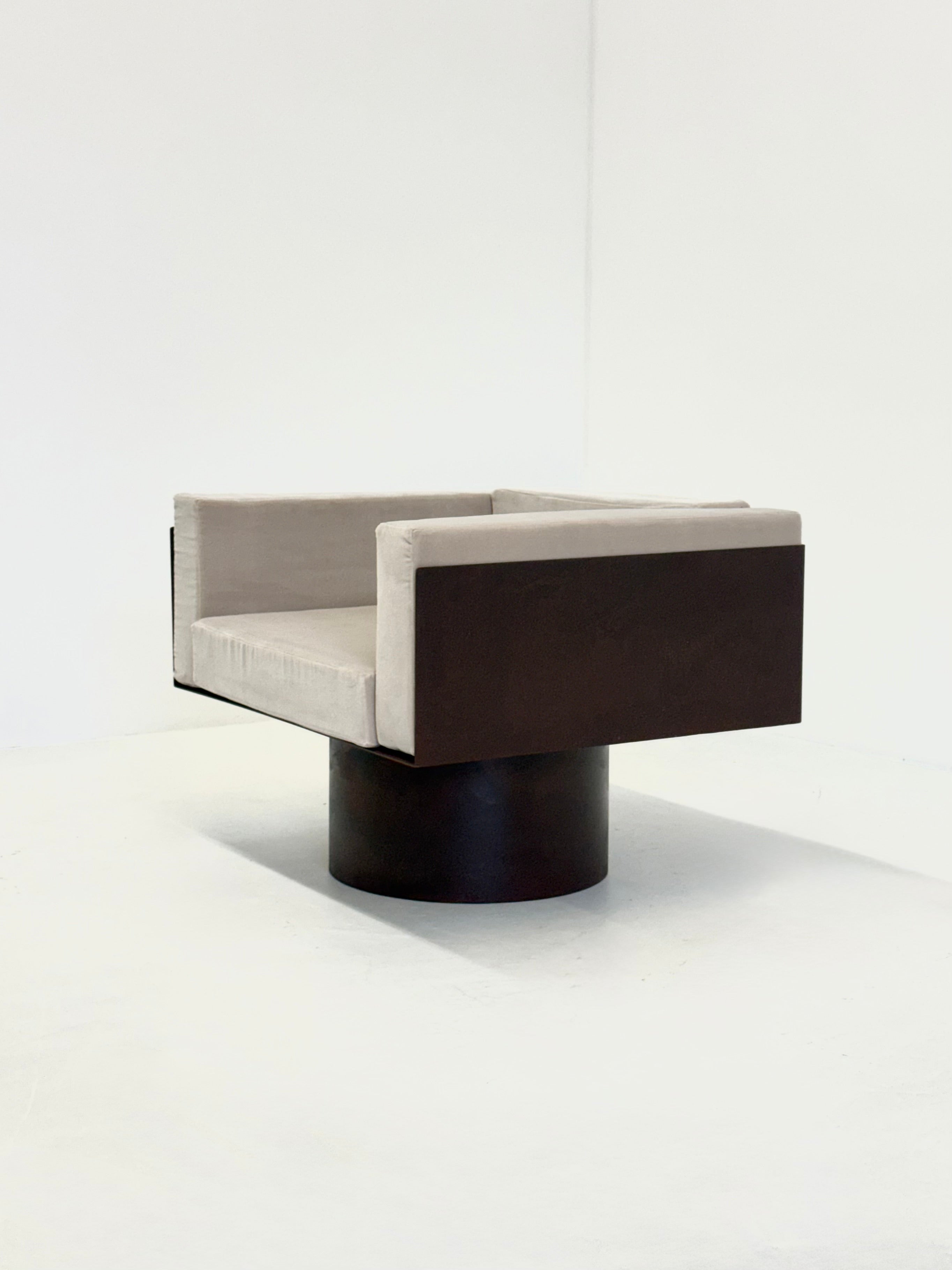 Sculptural Italian metal lounge chair — lifestyle setting