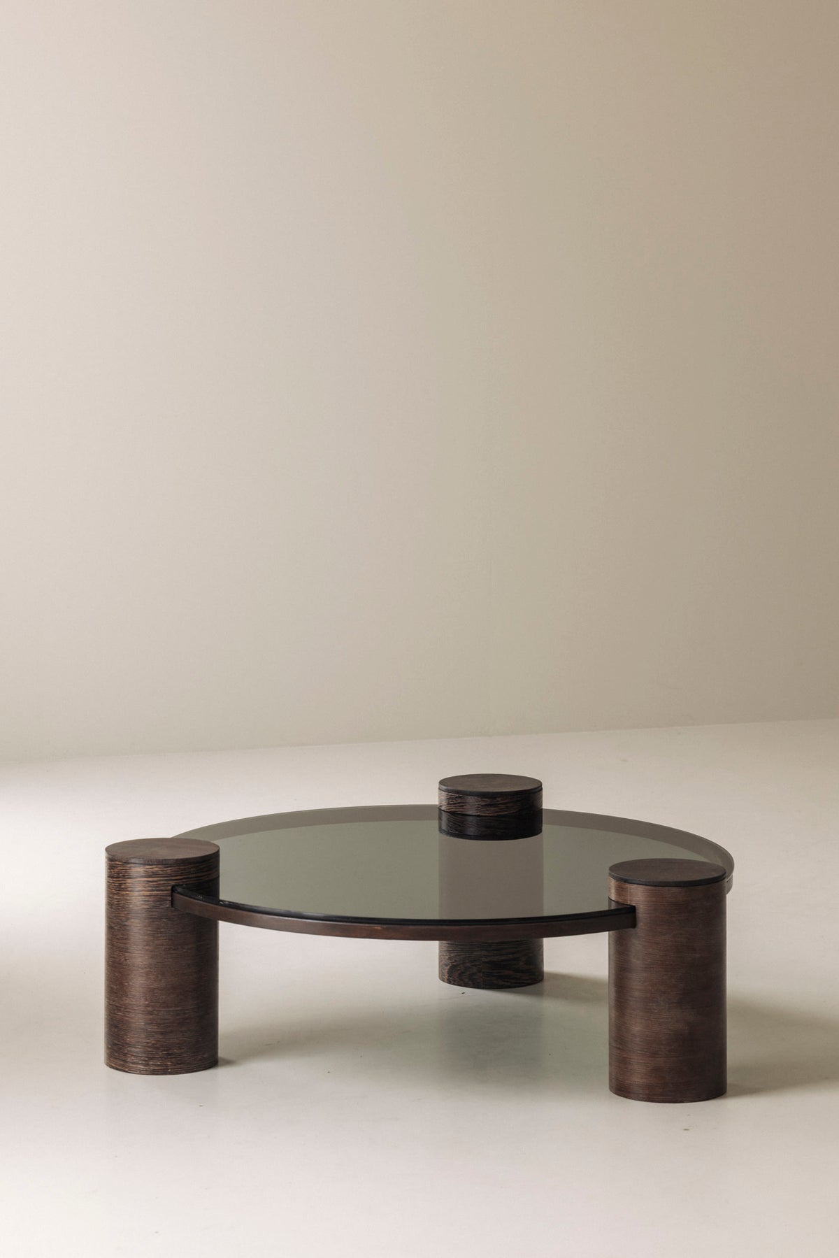 Sculptural Brutalist Wengé and Smoked Glass Round Coffee Table, 1970s — close-up