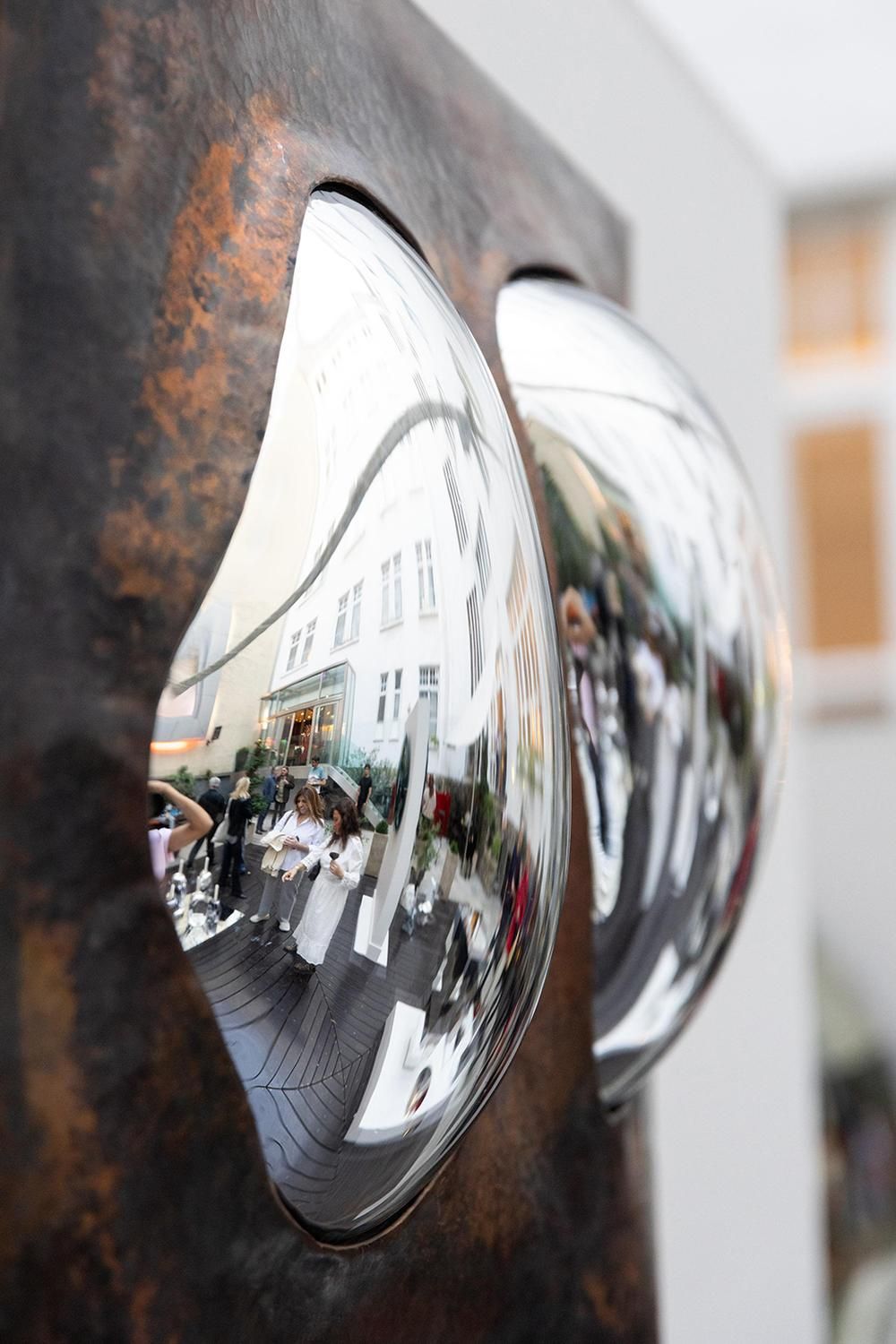 Drop of Silver on Copper II' Wall Sculpture — side angle showing reflective silver detail
