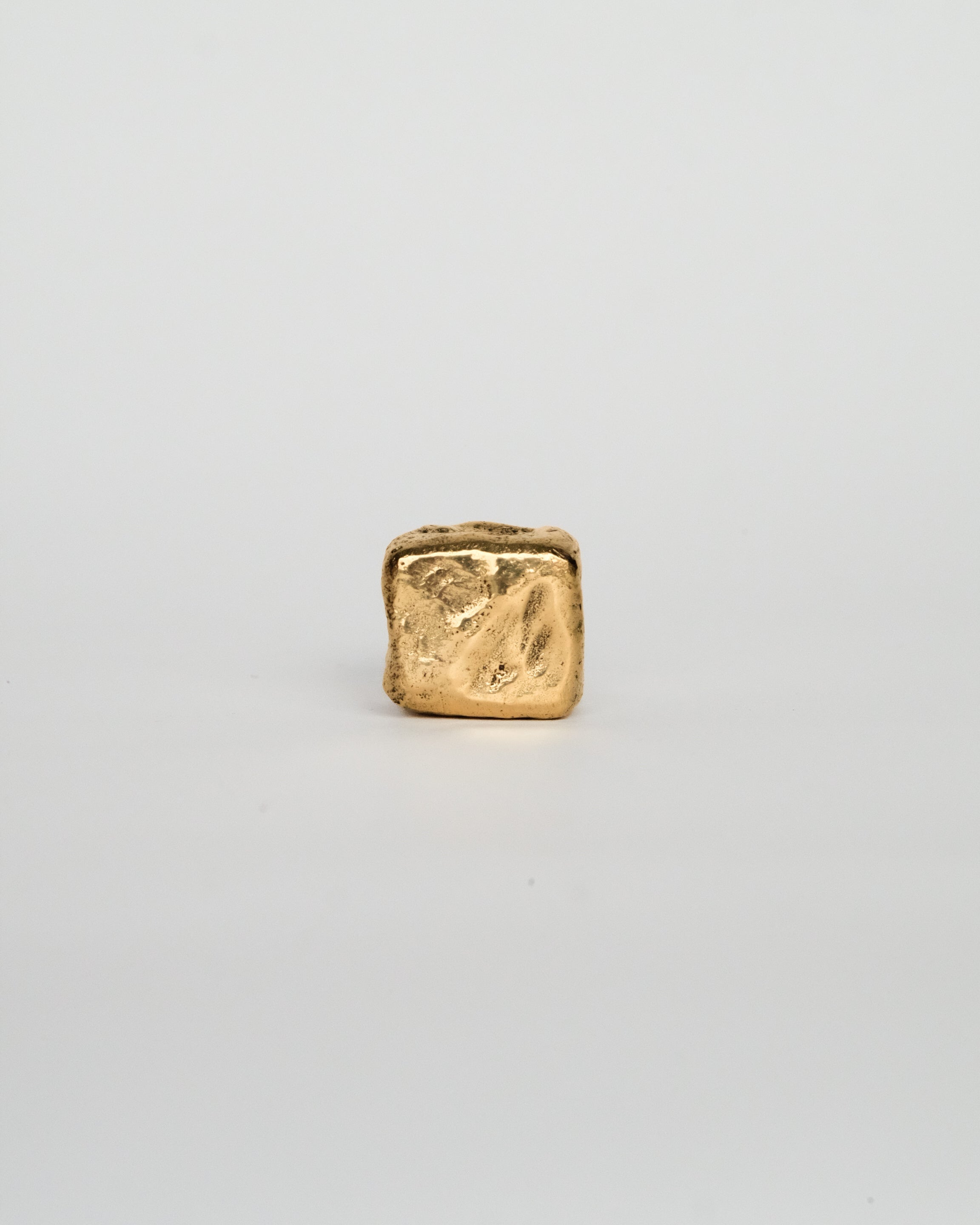 ISLE Cabinet Knob/Wall Hook Small — front view of textured gold finish
