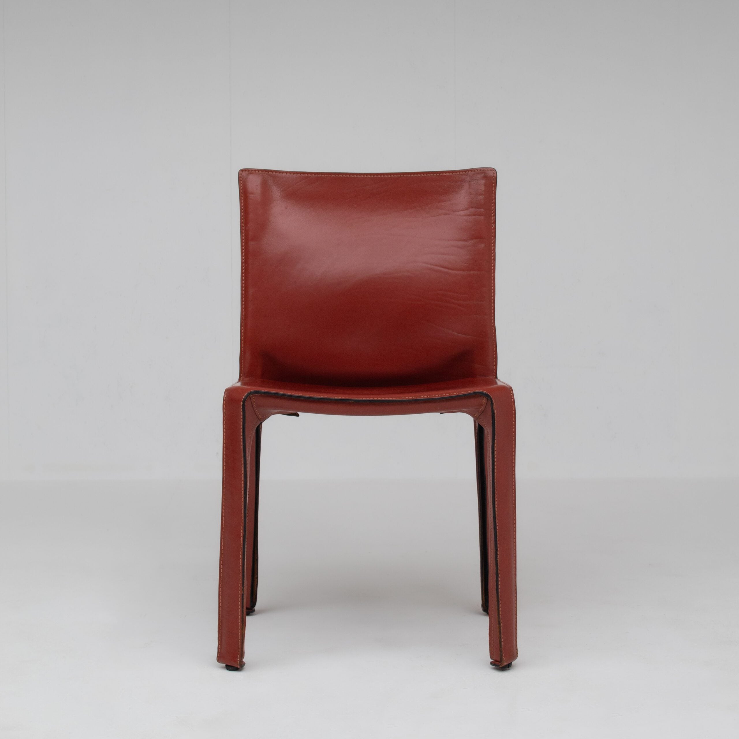 Mario Bellini Cab Chairs for Cassina in Red Leather — lifestyle setting
