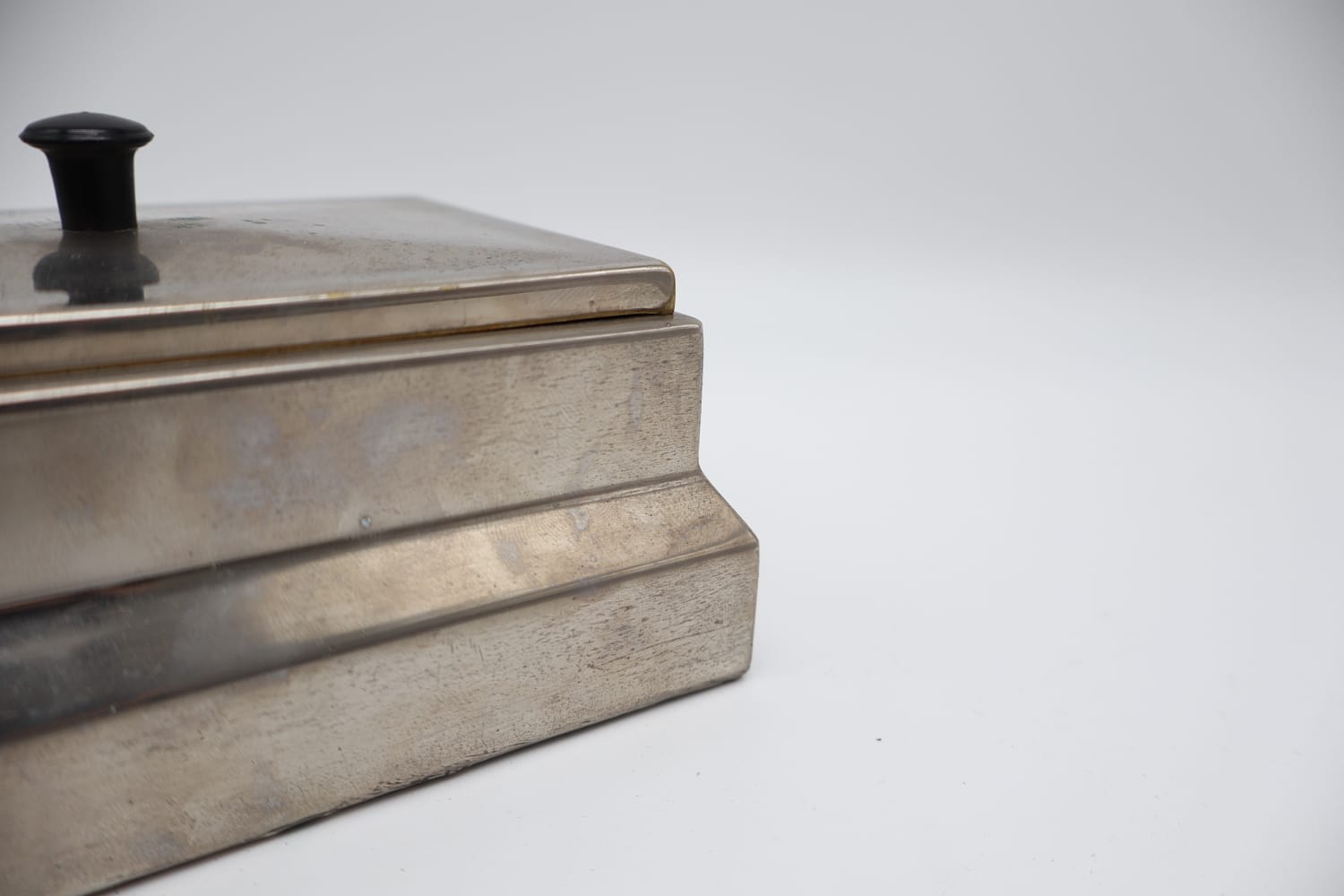 Art Deco Stepped Pewter Cigar Box with Bakelite Finial, 1930s — close-up