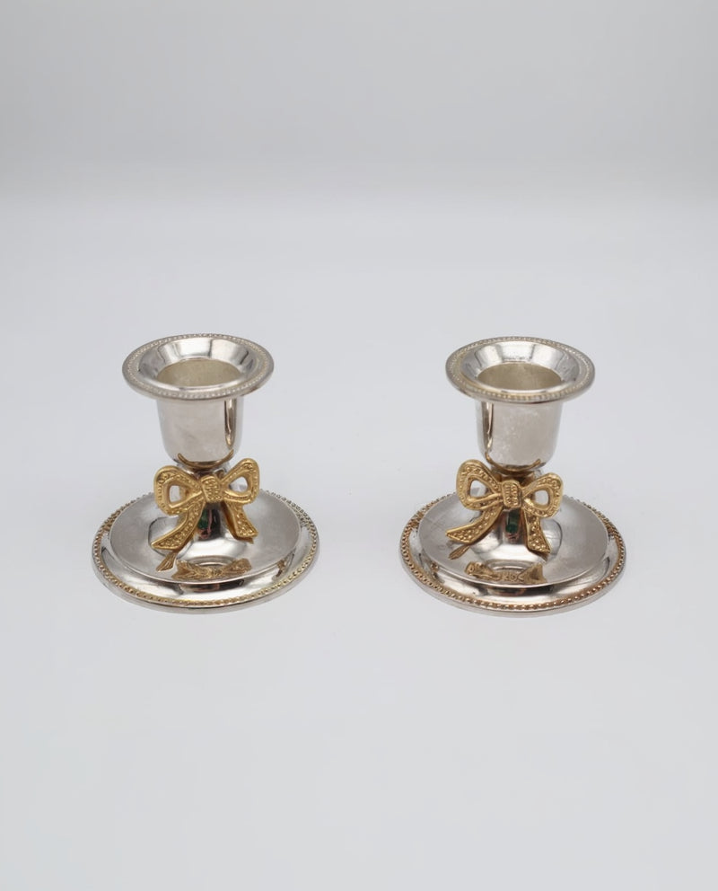 Pair of Vintage Silver-Plated Candlesticks with Gilt Bow Accents by Forma Finds | The Oblist