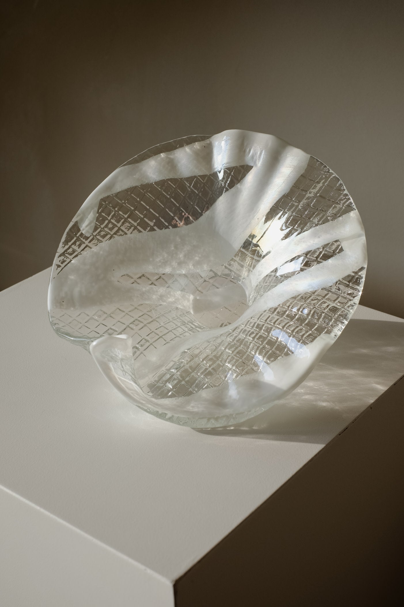 Italian Glass Bowl — angled view on white pedestal