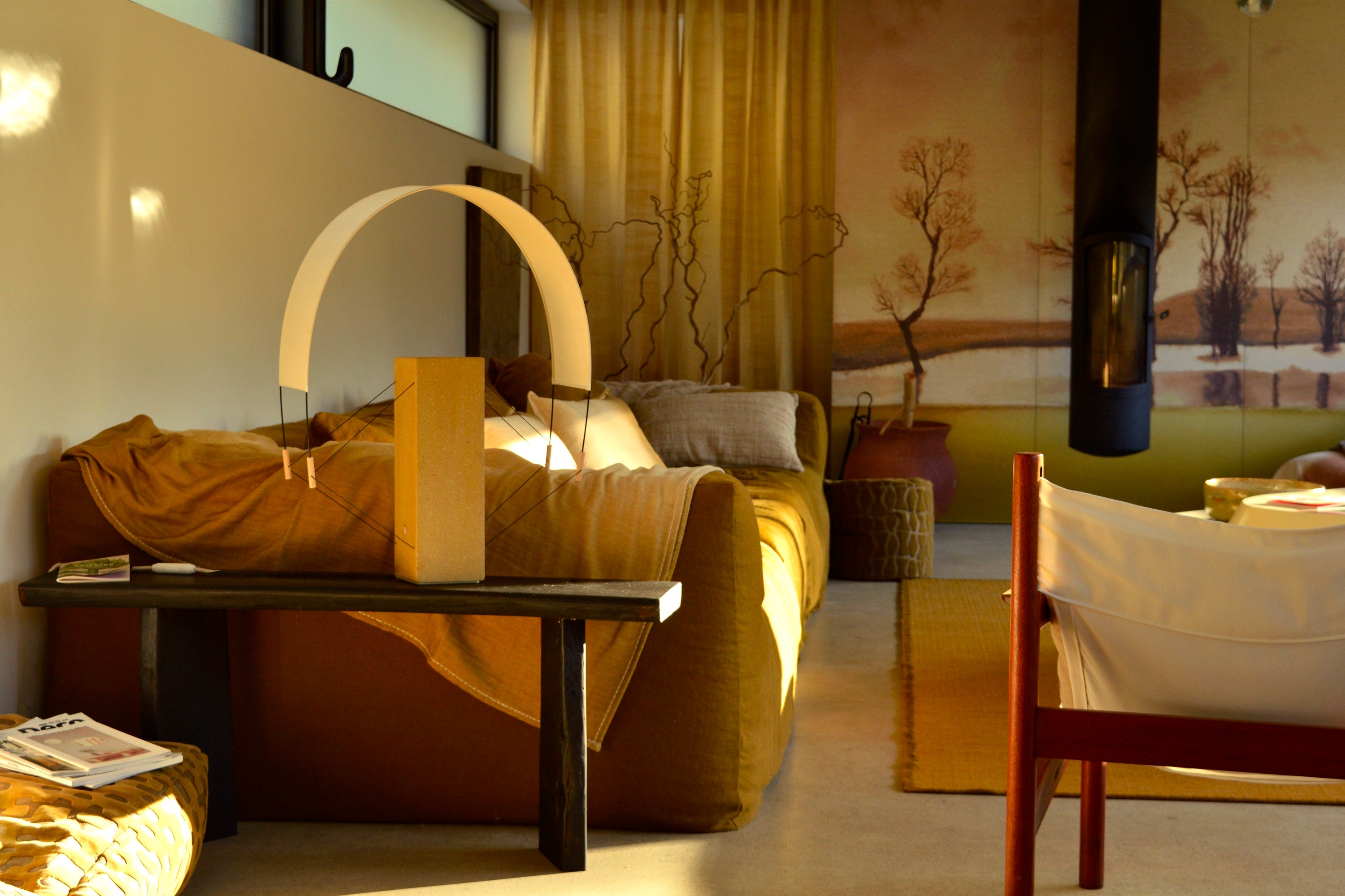 Coastal Modern Table Lamps in Raw clay - Lumia - Collection Aura — lamp on wooden table in cozy living room