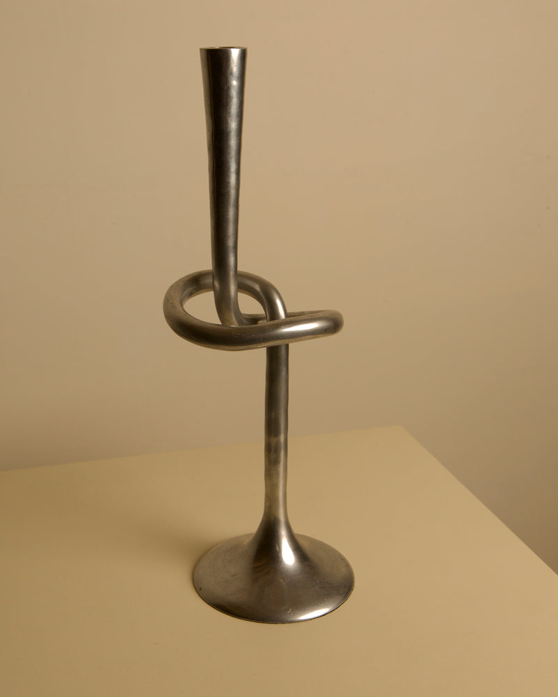 80s Aluminum "Knot" Candleholder — close-up of metallic surface and design