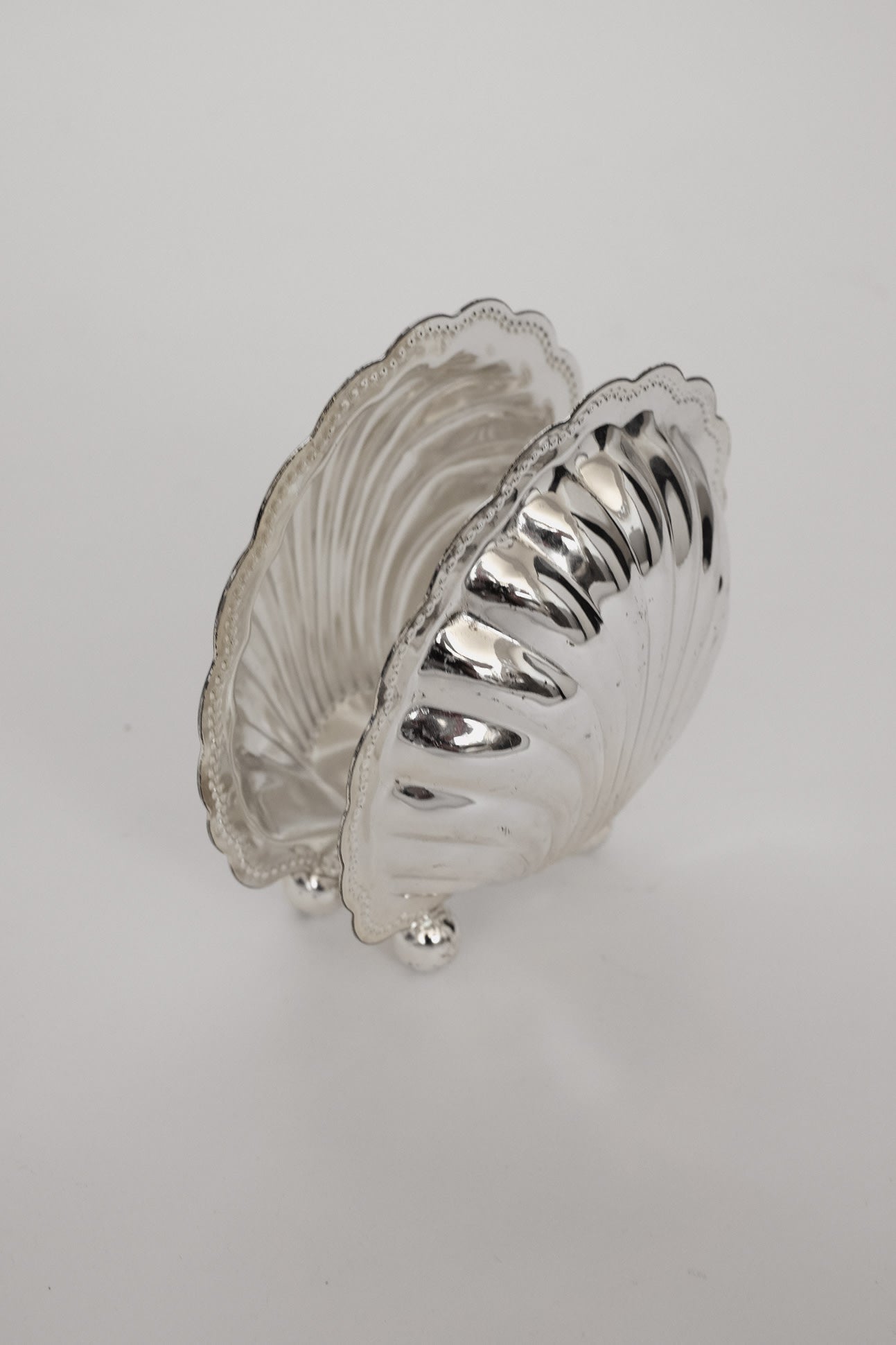 Vintage Silver-Plated Shell Napkin Holder — side angle