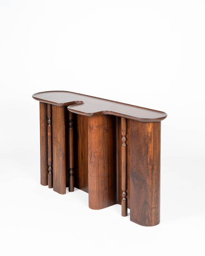 Ridge Console Table — side view highlighting wooden cylindrical legs