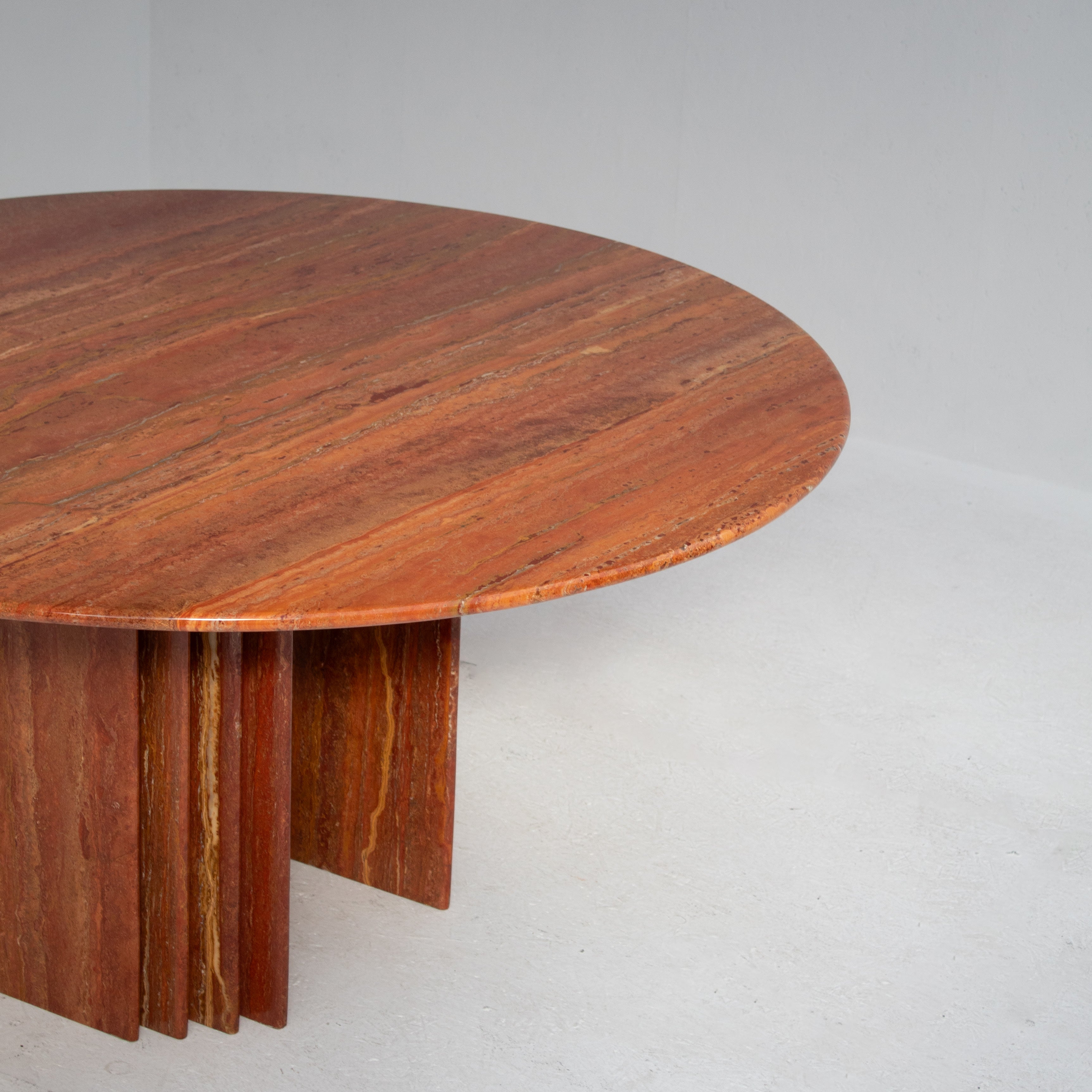 Round Dining Table in Rosso Travertino