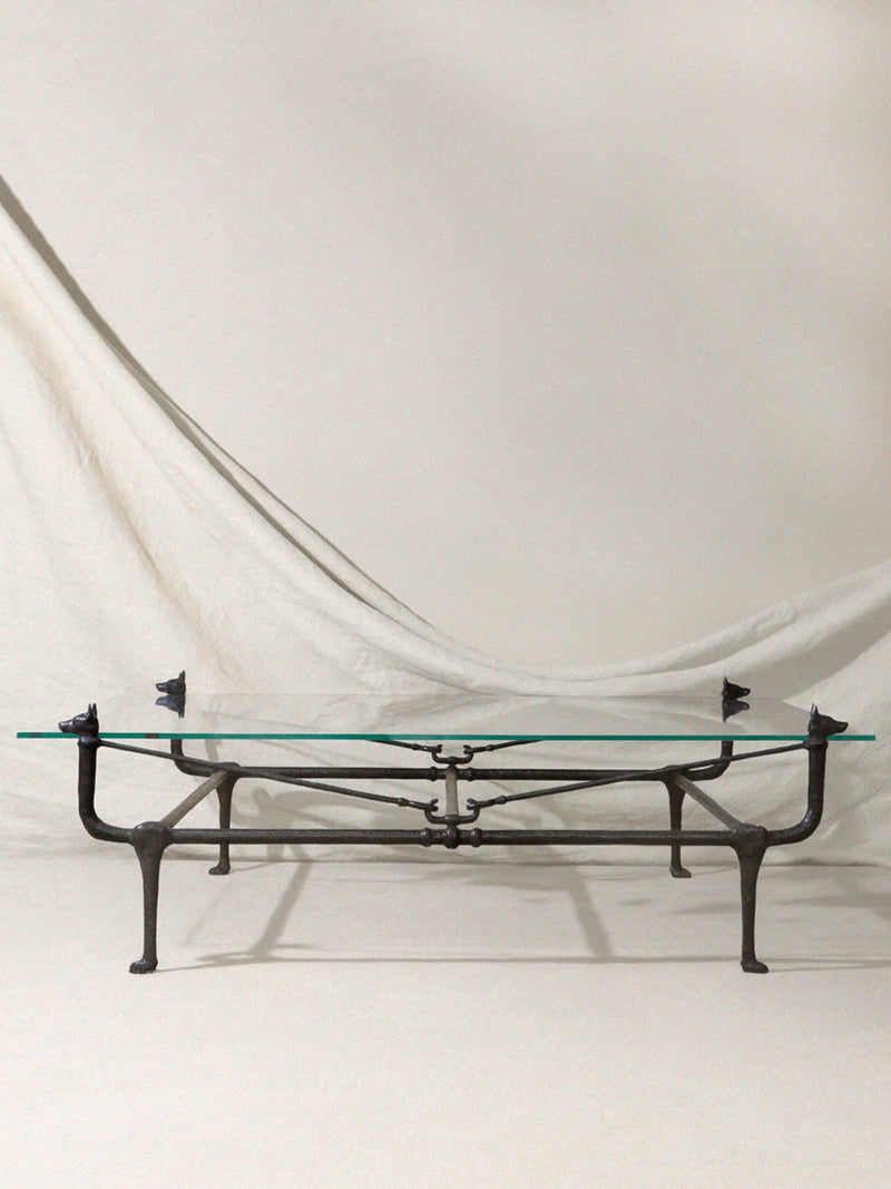 Loyal Bronze Dog Coffee Table — side view of bronze legs and glass top