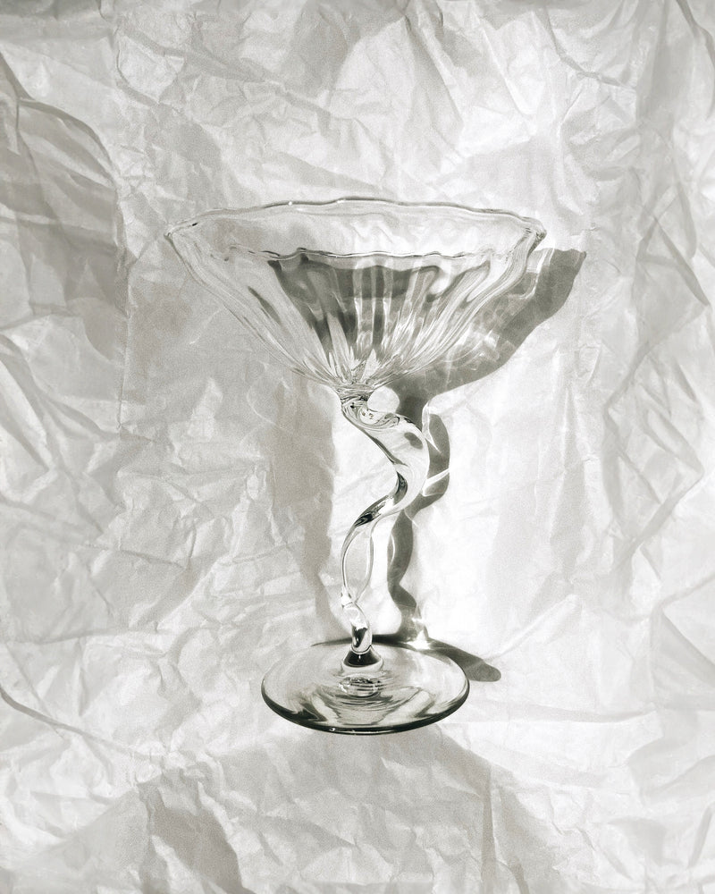 Crystal cocktail coupe with twisted ribbon stem and fluted bowl