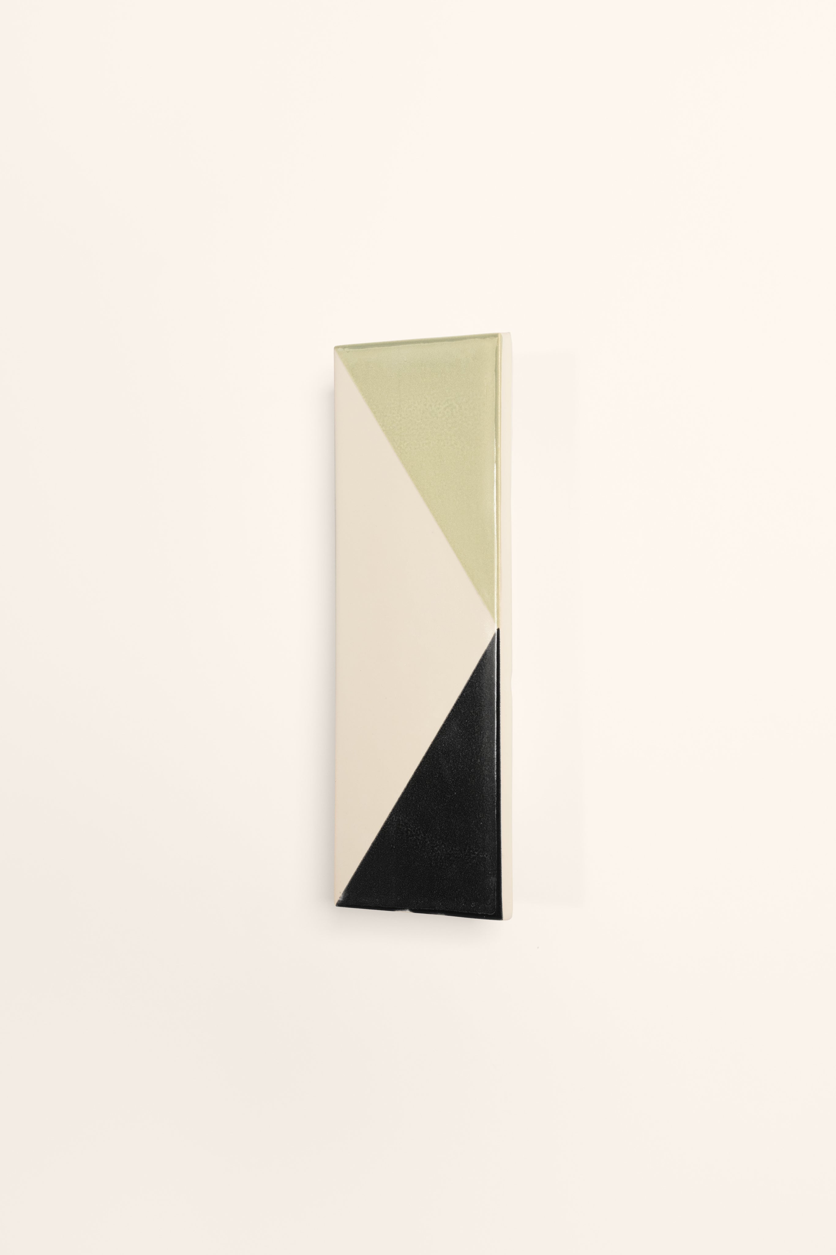 Tile VN — angled view of ceramic wall lamp in neutral tones