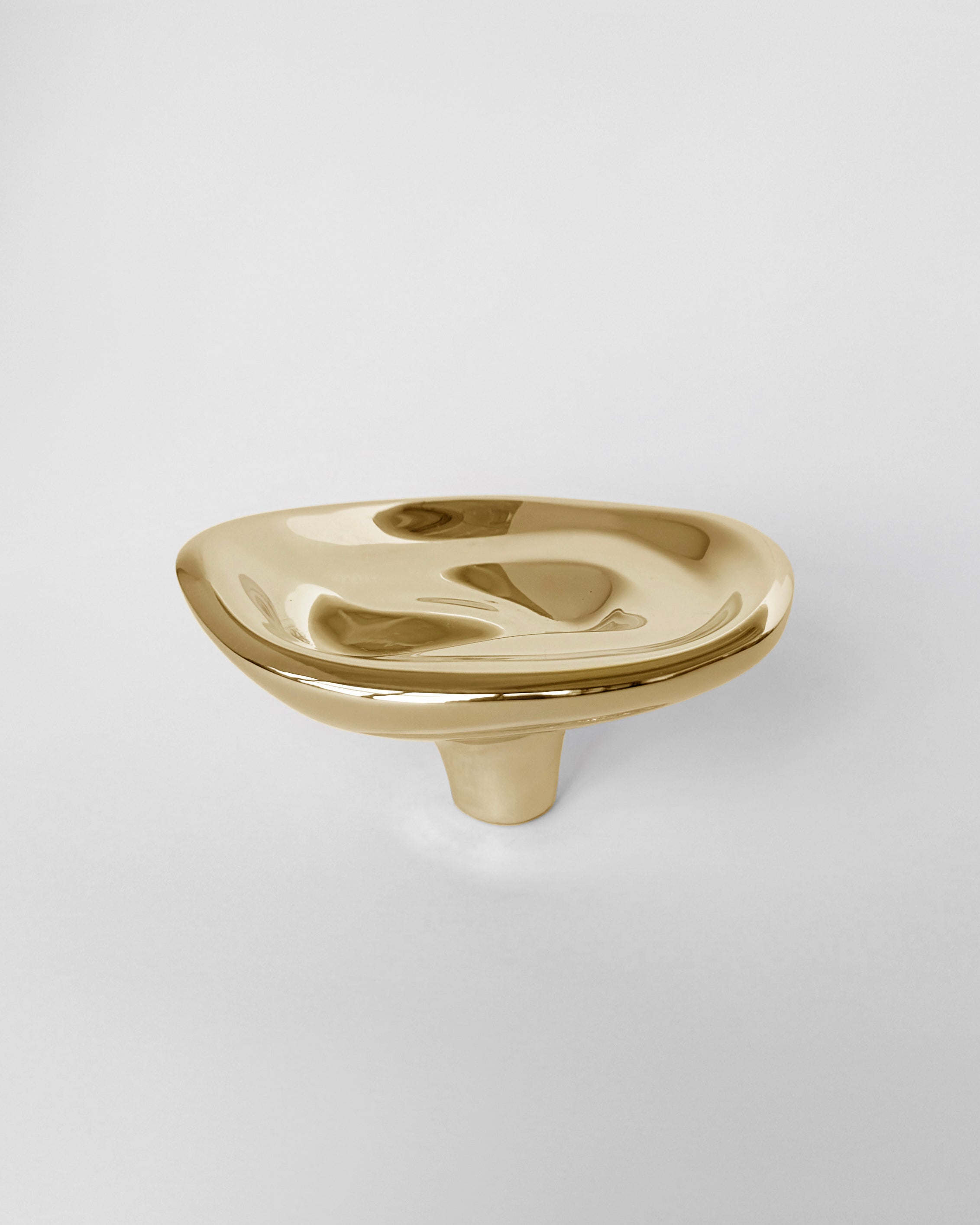 Ripple Hook - Small - Brass — side angle showing reflective brass surface