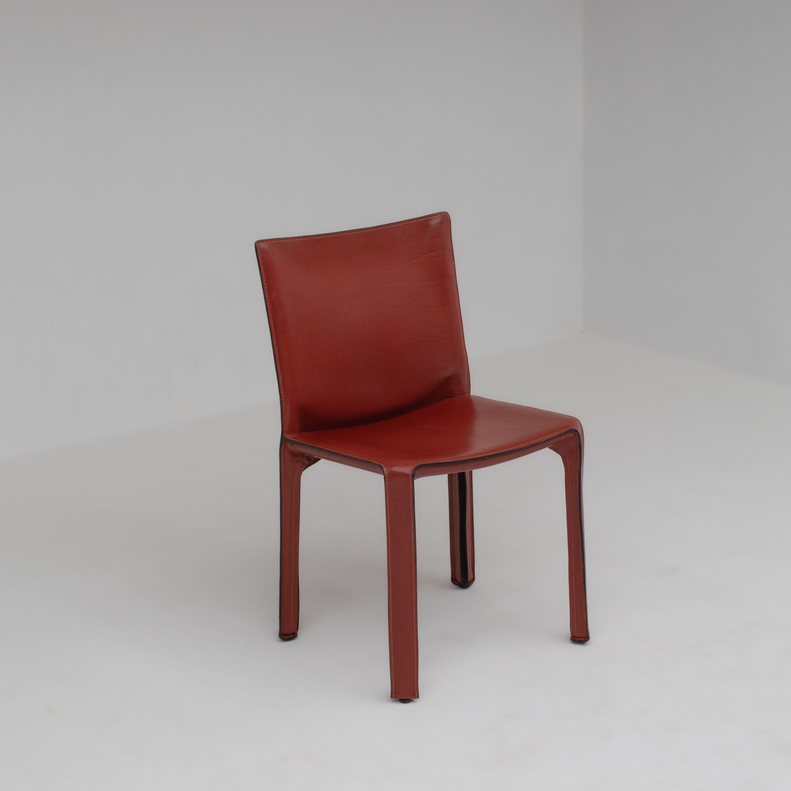 Mario Bellini Cab Chairs for Cassina in Red Leather — side angle