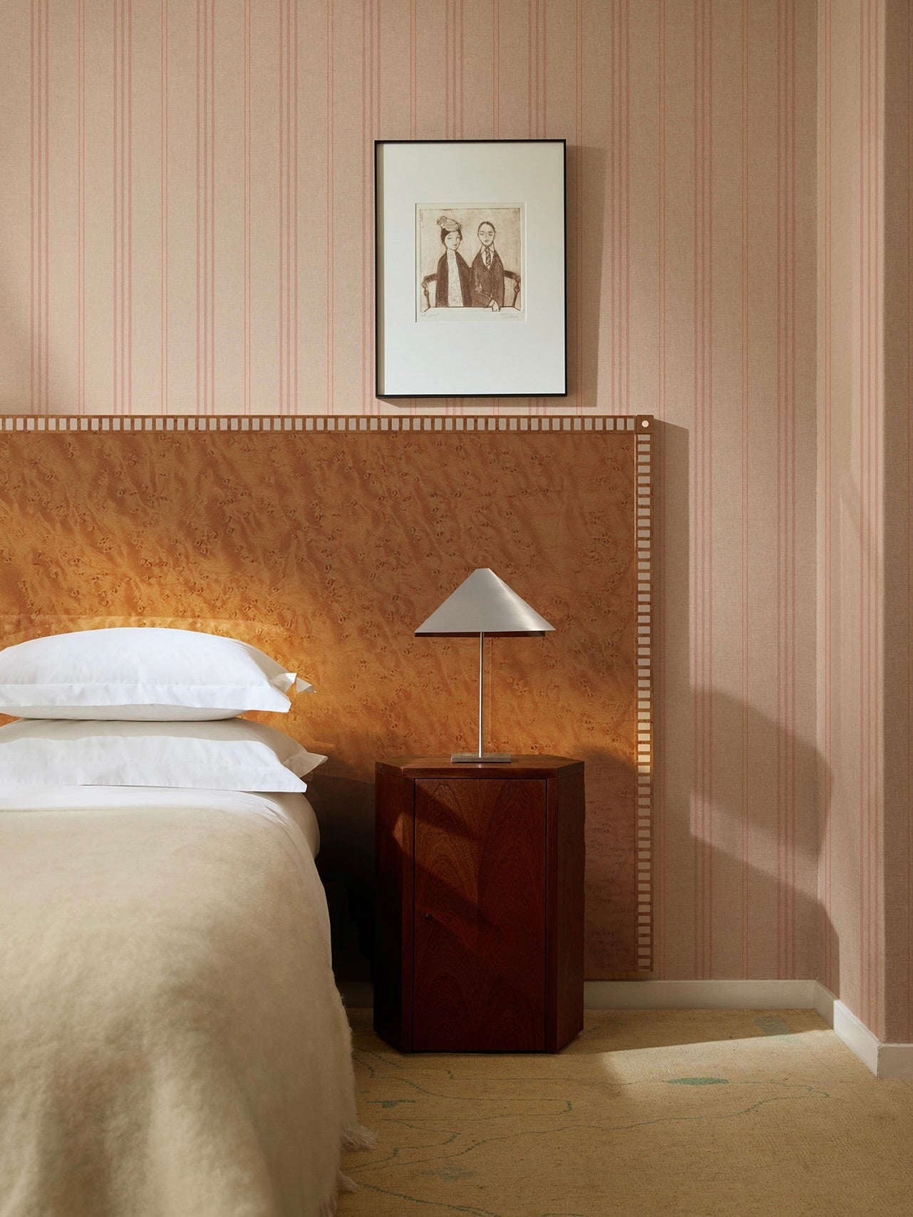 Aquarama Headboard in Birds Eye Maple — back view against striped wall