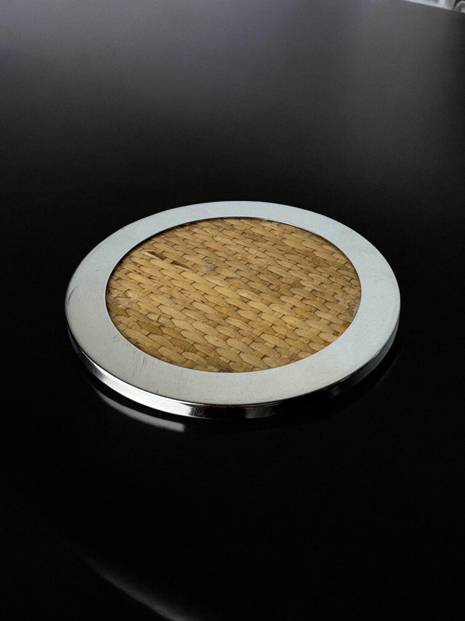Christian Dior Style Lucite & Rattan Bottle Coaster, Italy, 1970's — side angle showing woven rattan center on black surface