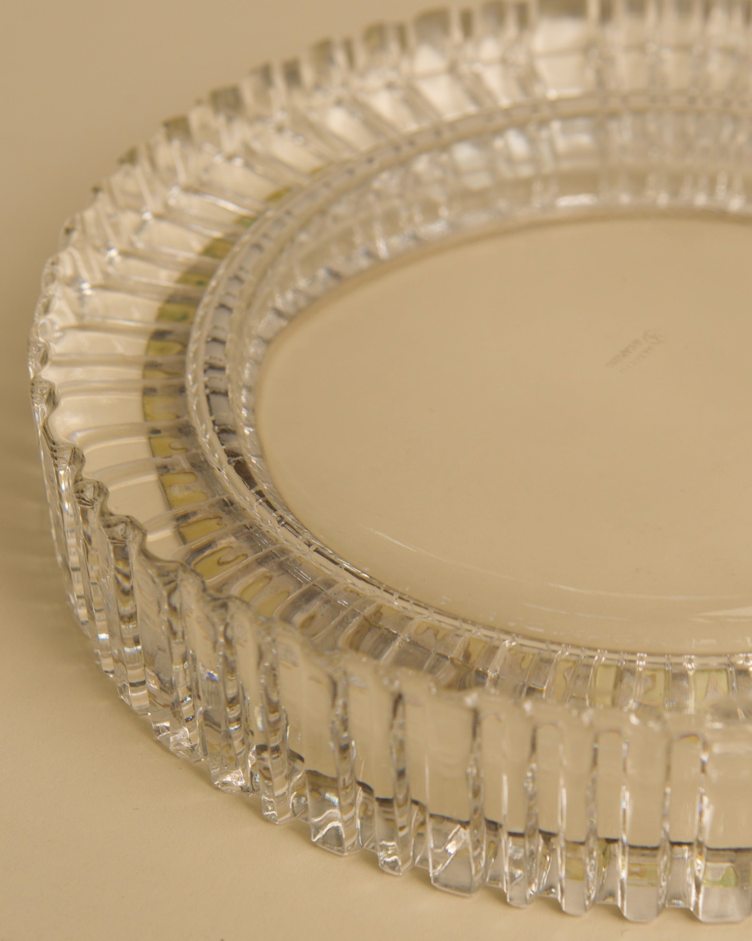 Crystal vide-poche detail showing ridged rim and transparent glass