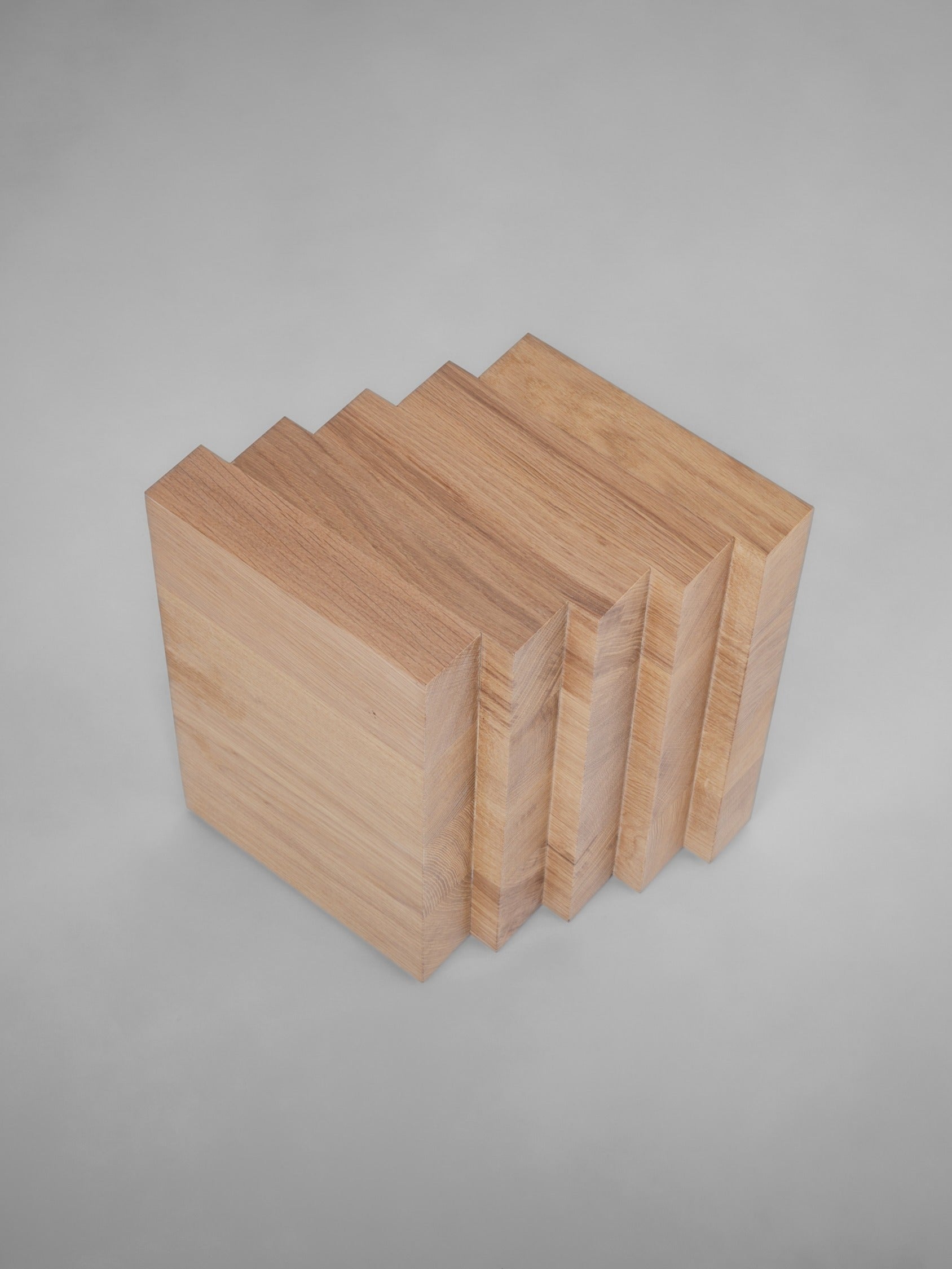 Scalae Side Table — stacked wooden blocks from back view