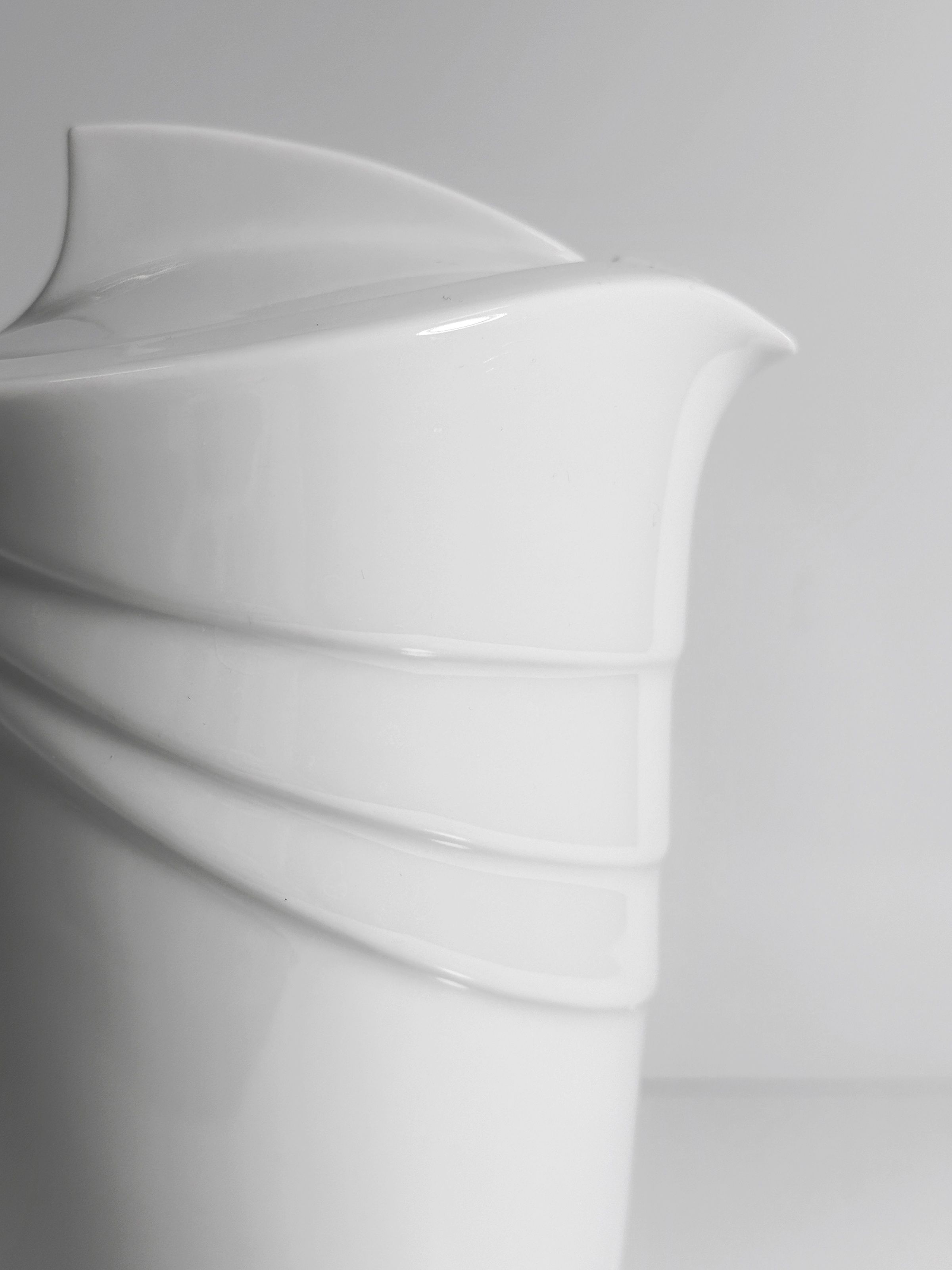 White Art Deco porcelain pitcher showing stacked geometric design