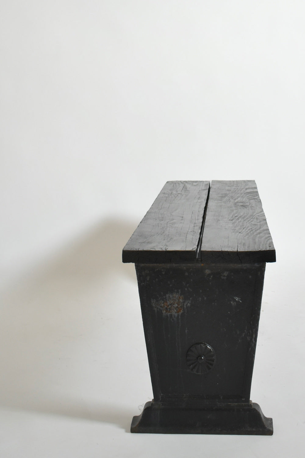 Skoglund & Olson Cast Iron Bench, 1920s — side view showing black cast iron base