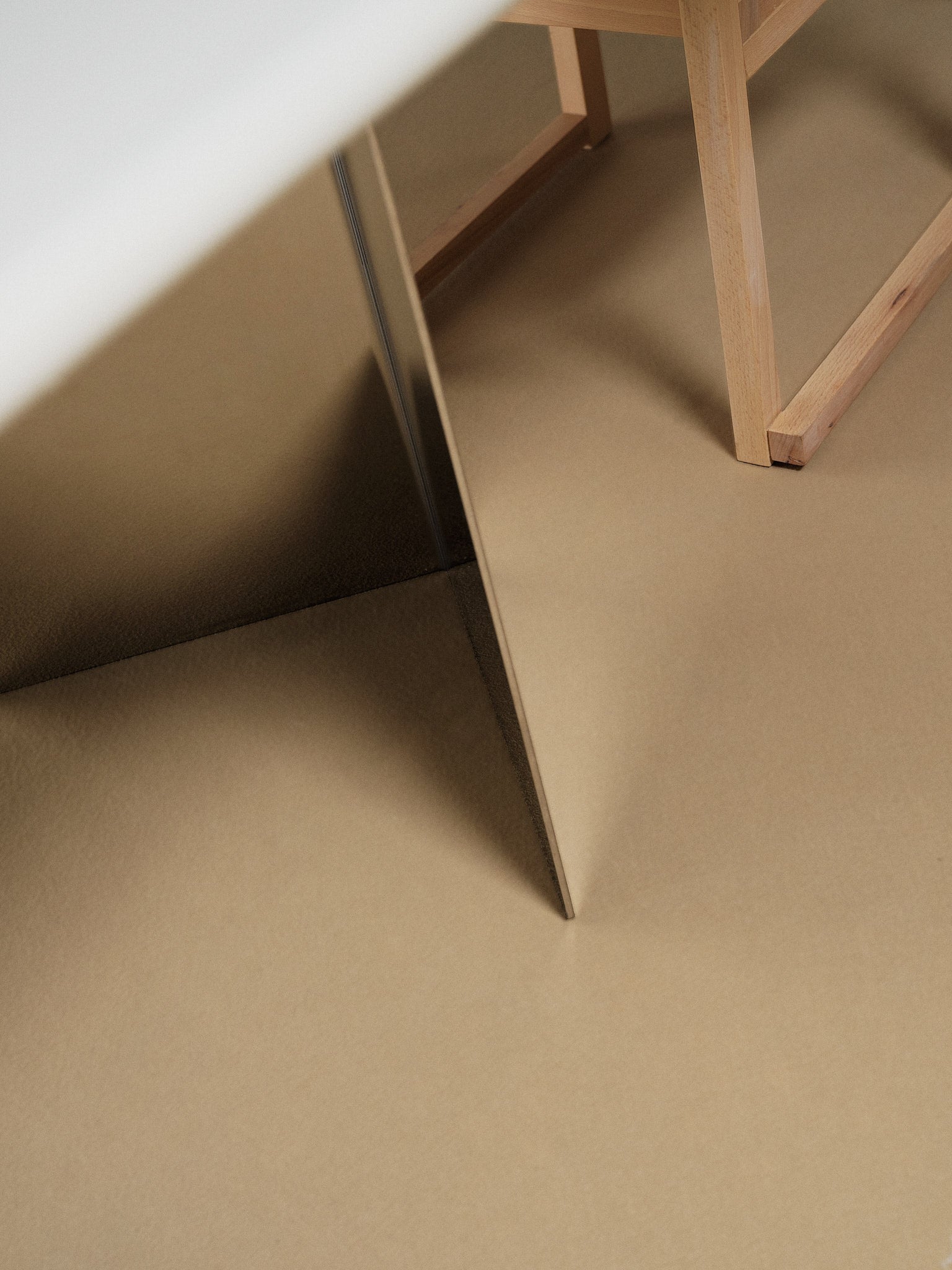 Adol dining table — side angle