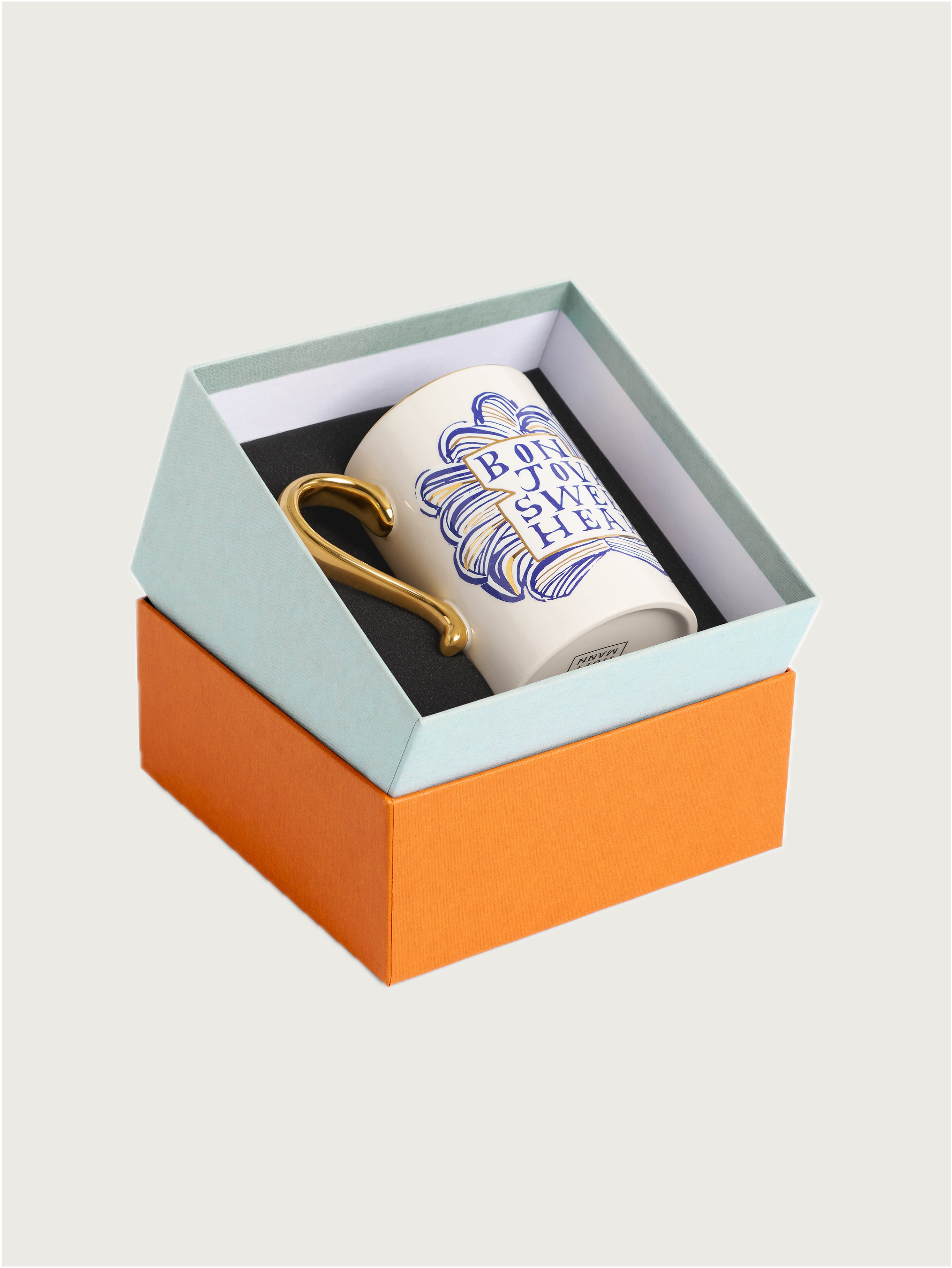 Ruan Hoffmann Sweetheart Mug — angled view in gift box with gold handle