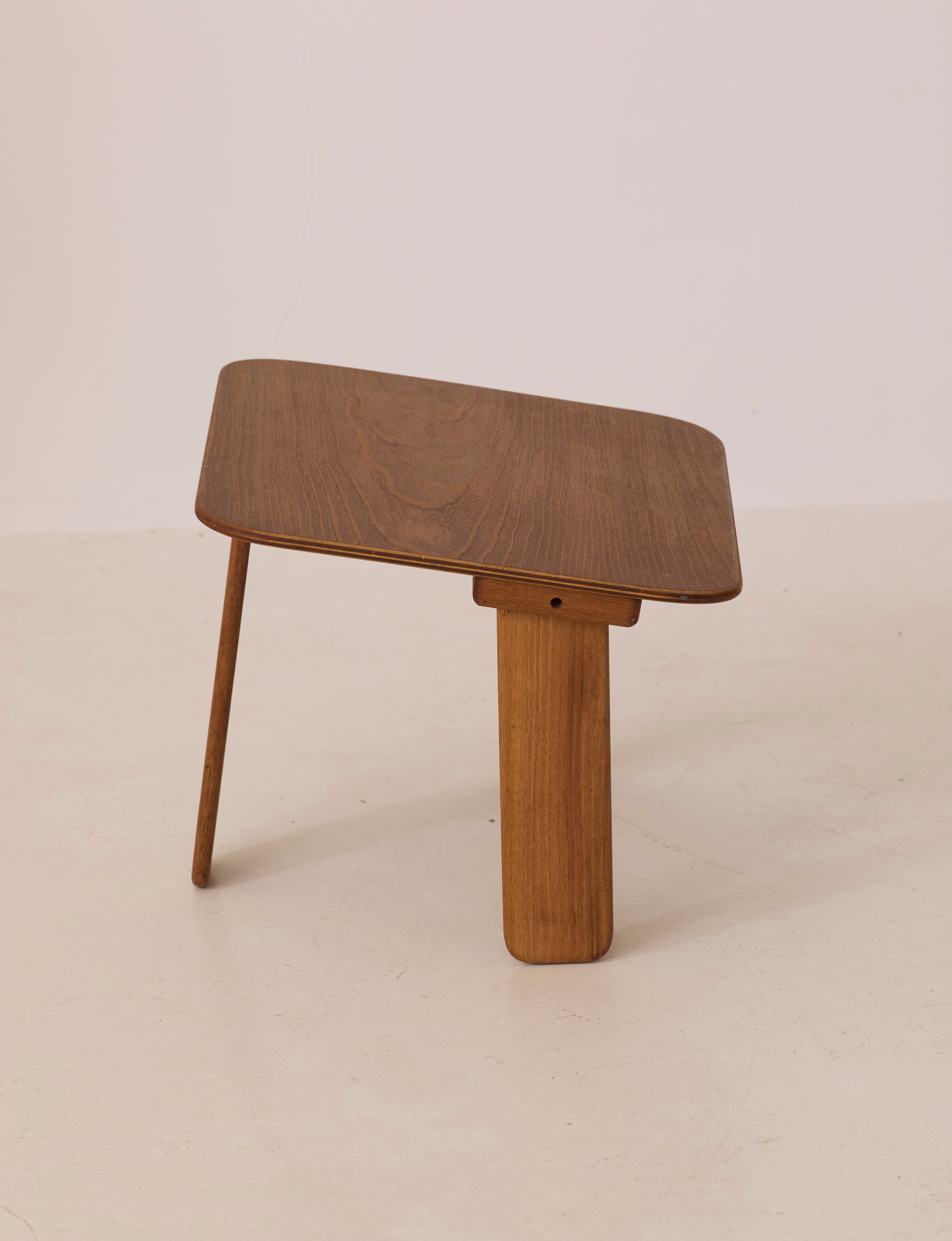 Small dismountable wooden meditation table by Alain Gaubert, France circa 1980 — angled view highlighting rich wood grain tex