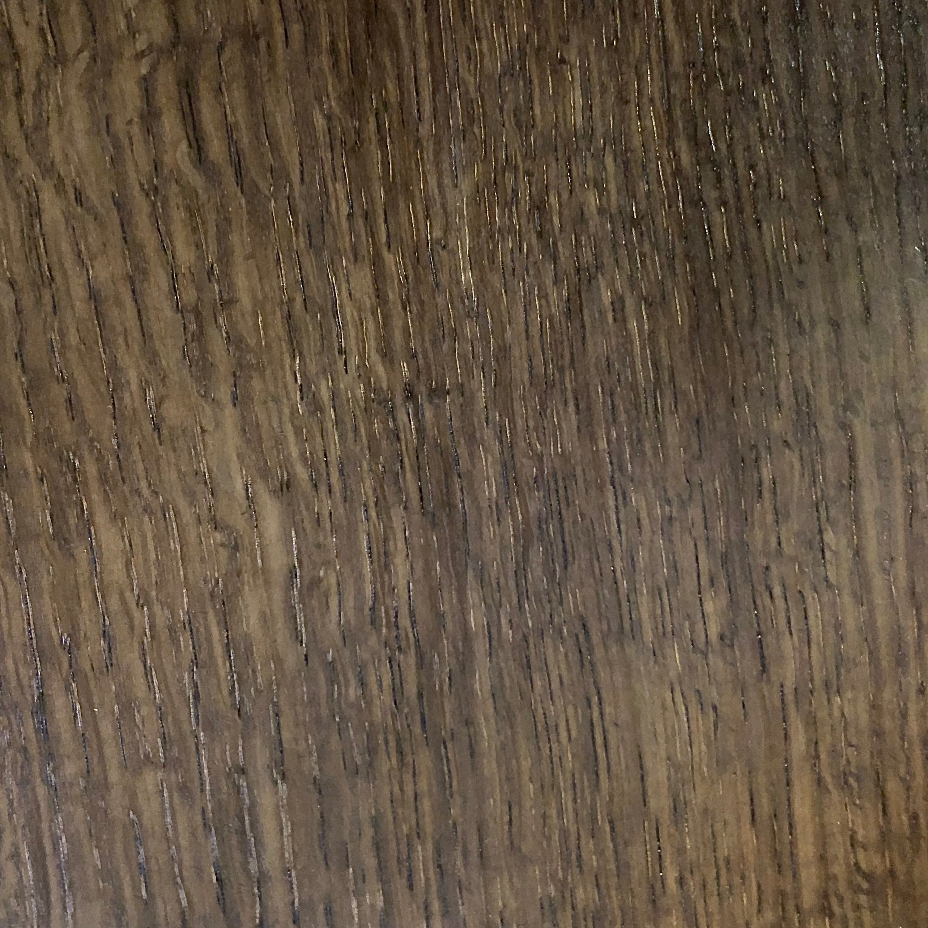 Taverne Chair — back view highlighting rich wood grain texture