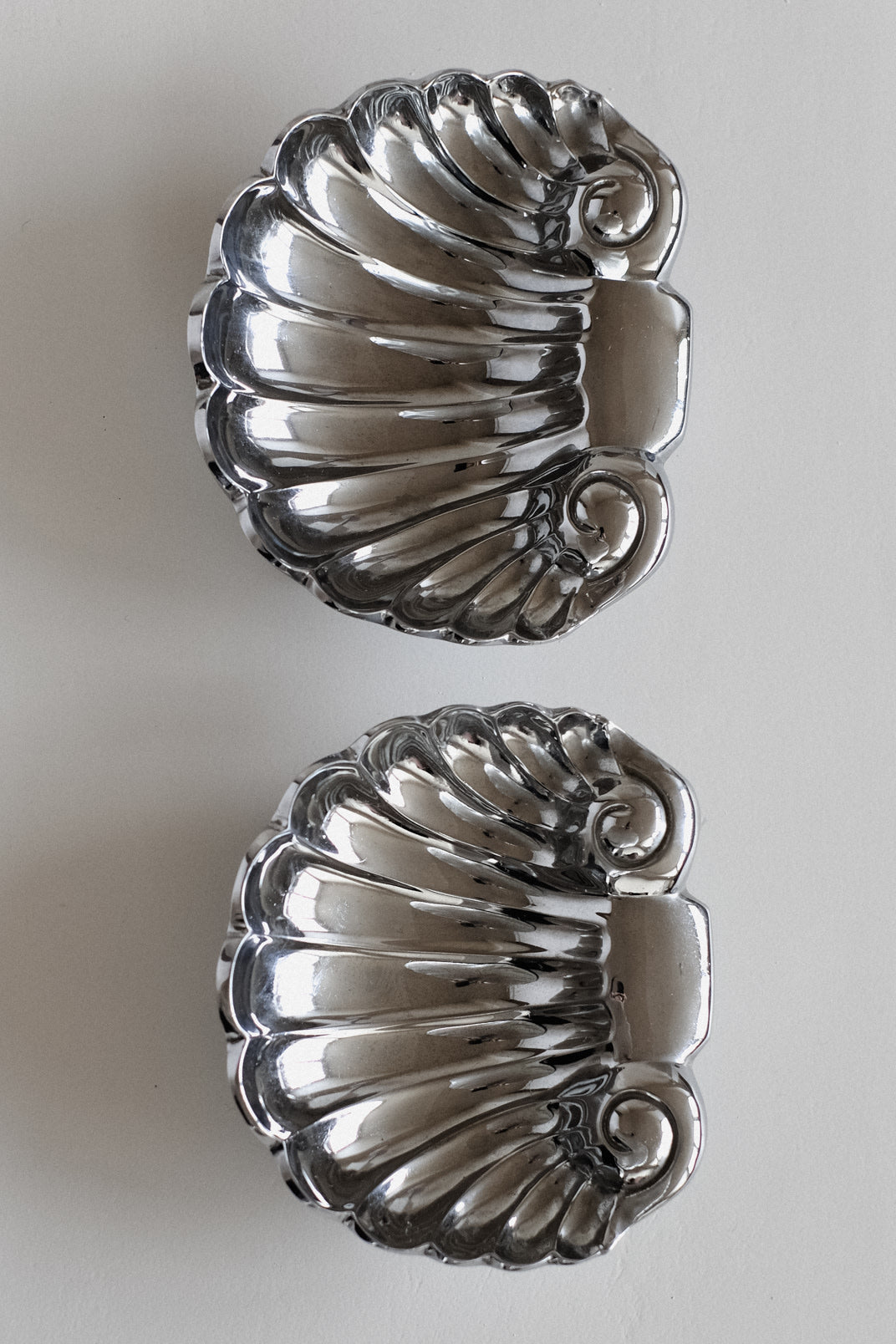 Set of 2 Shell Decorative Bowls — close-up of shiny silver finish