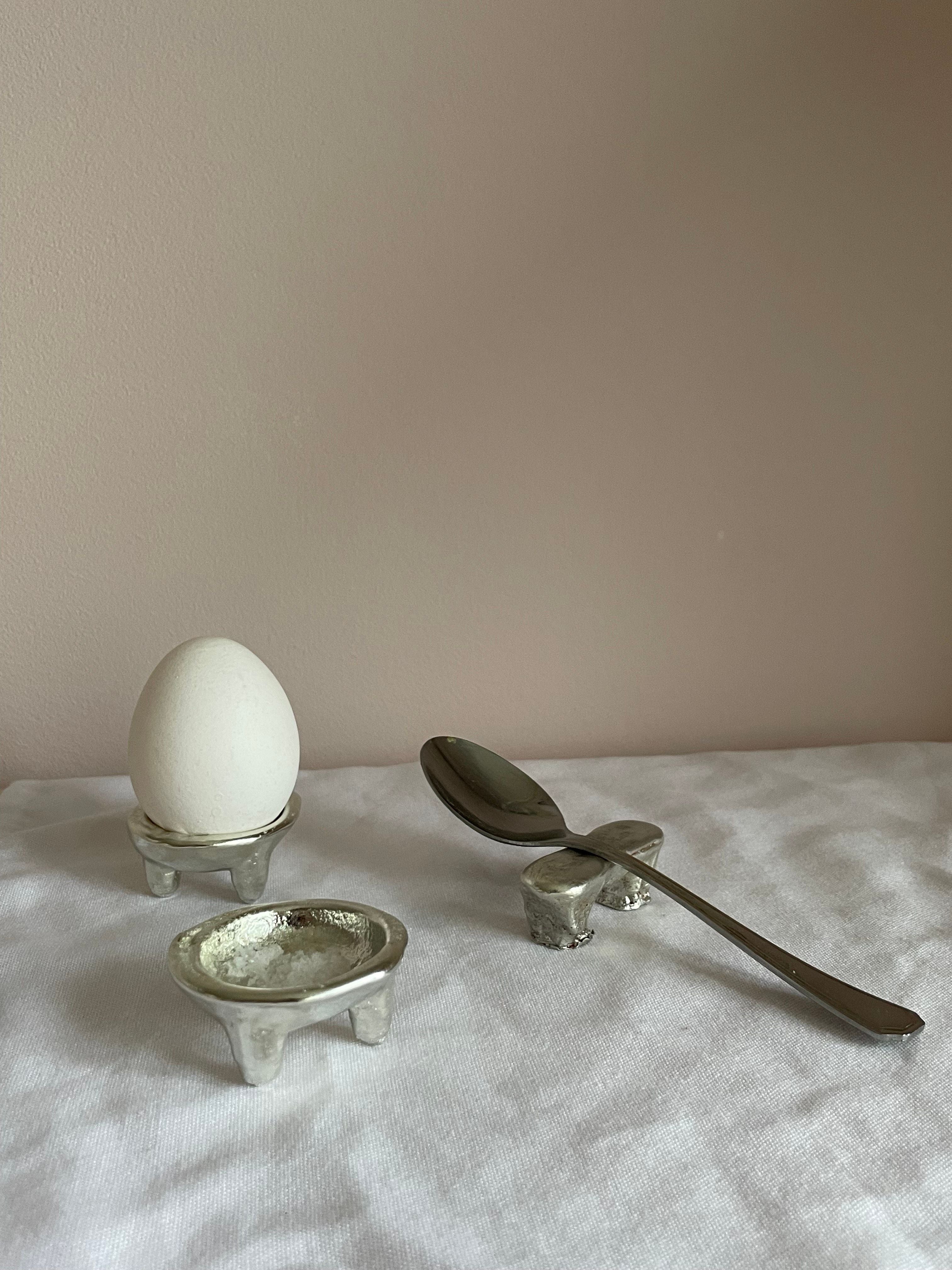 The Tin Collection / Breakfast Set — close-up of silver egg holder and spoon