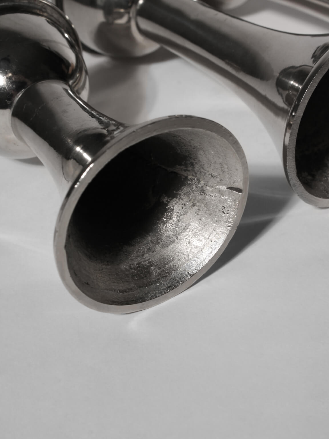 Mid-Century Silver Aluminum Candle Holders Set — lifestyle setting
