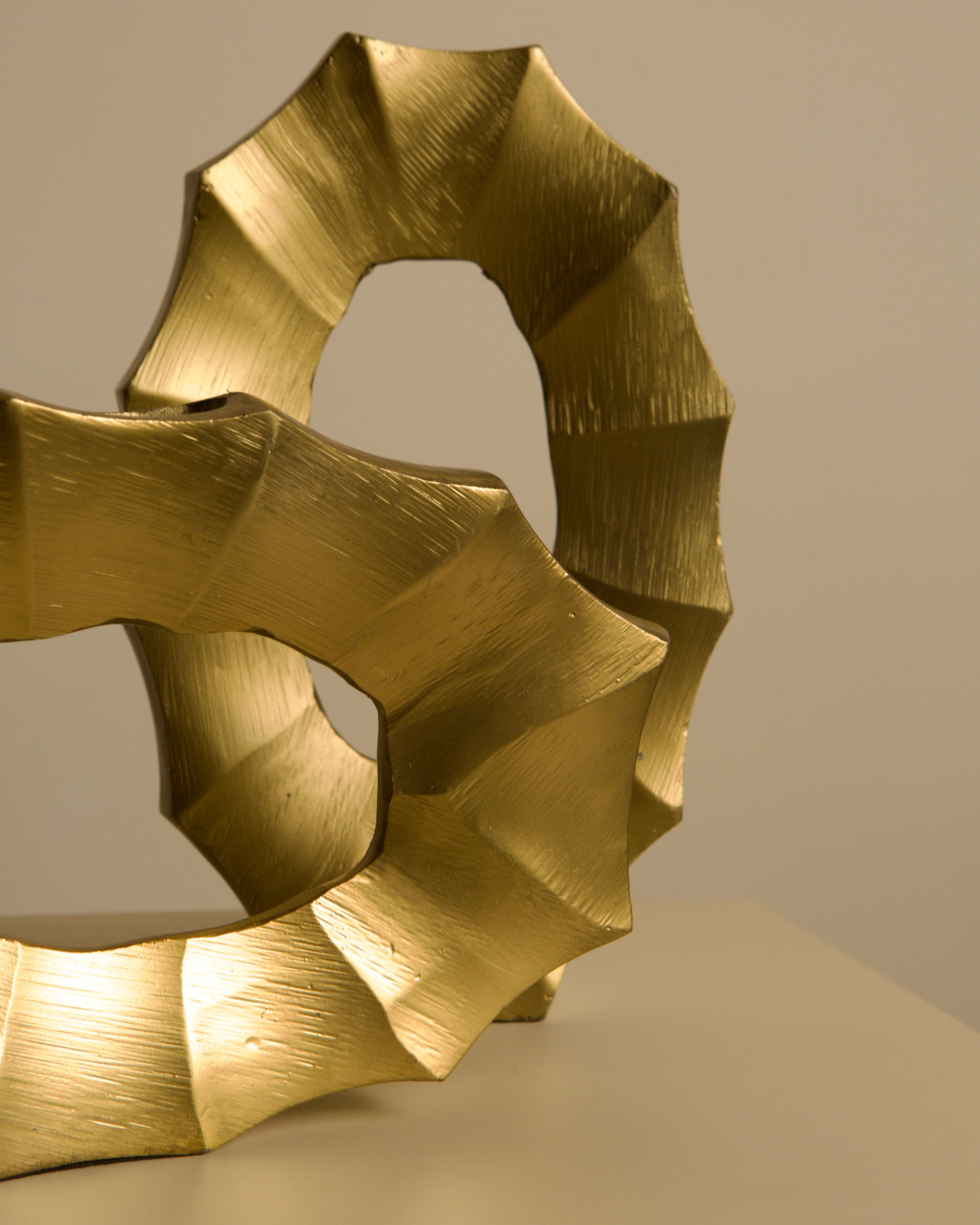 Pair of Italian 80s Gilt Aluminum Vases — top view highlighting textured gold finish