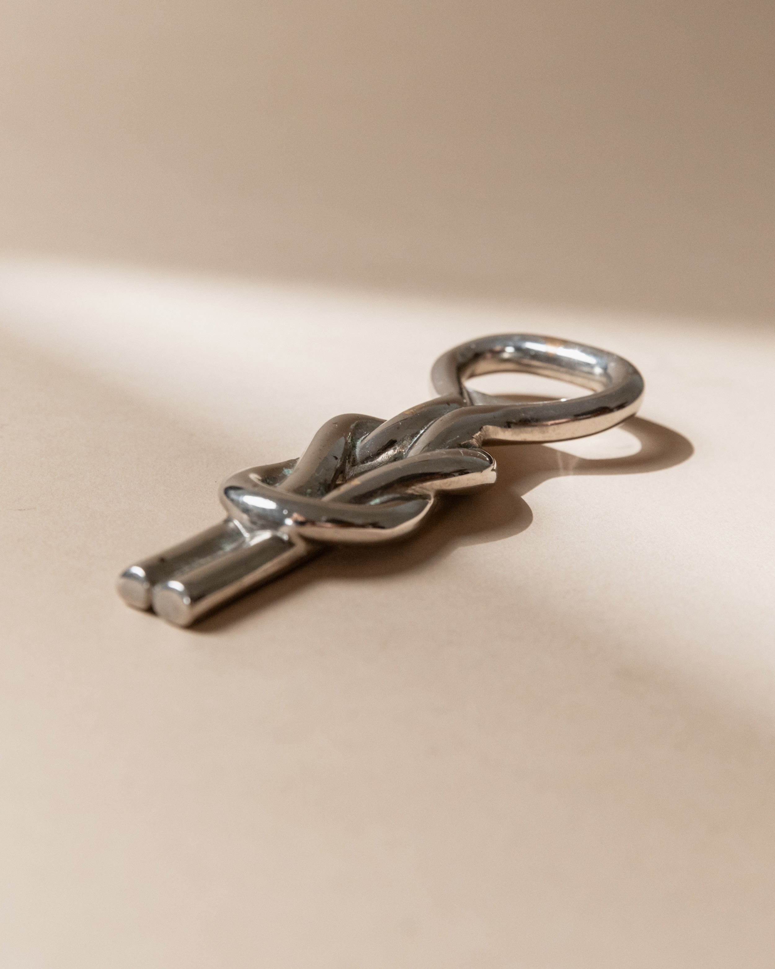 Ouvre-bouteille plaqué argent, Italie, années 1960