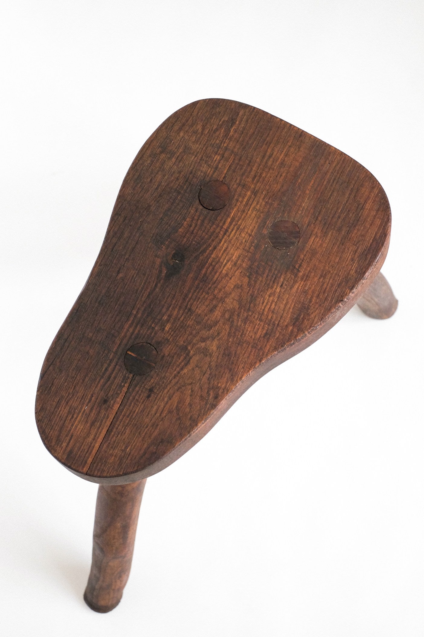 Rustic Vintage Three-Legged Wooden Stool — detail view